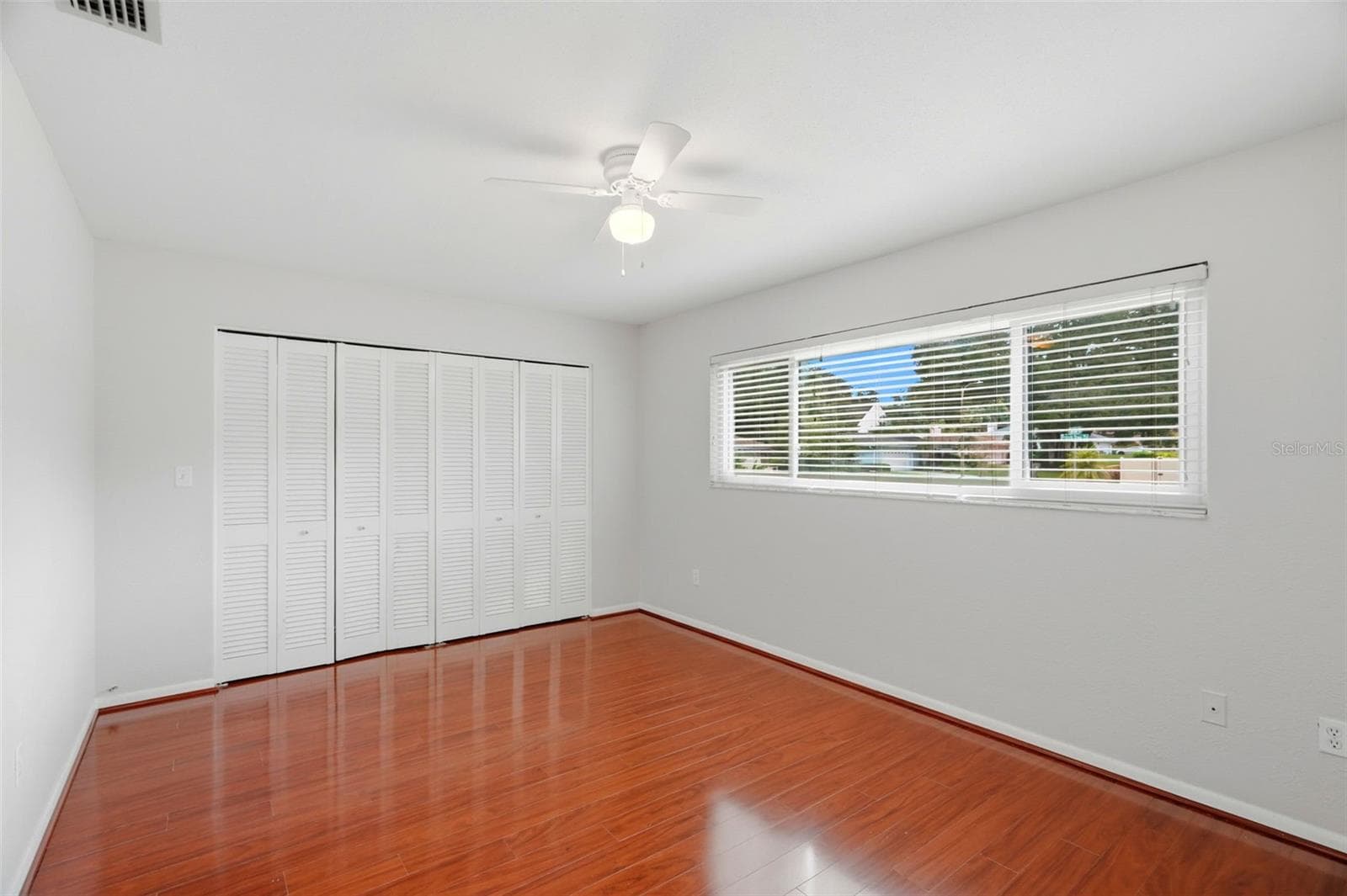 Spacious second bedroom. - 1297 PEACH TREE DR, DUNEDIN