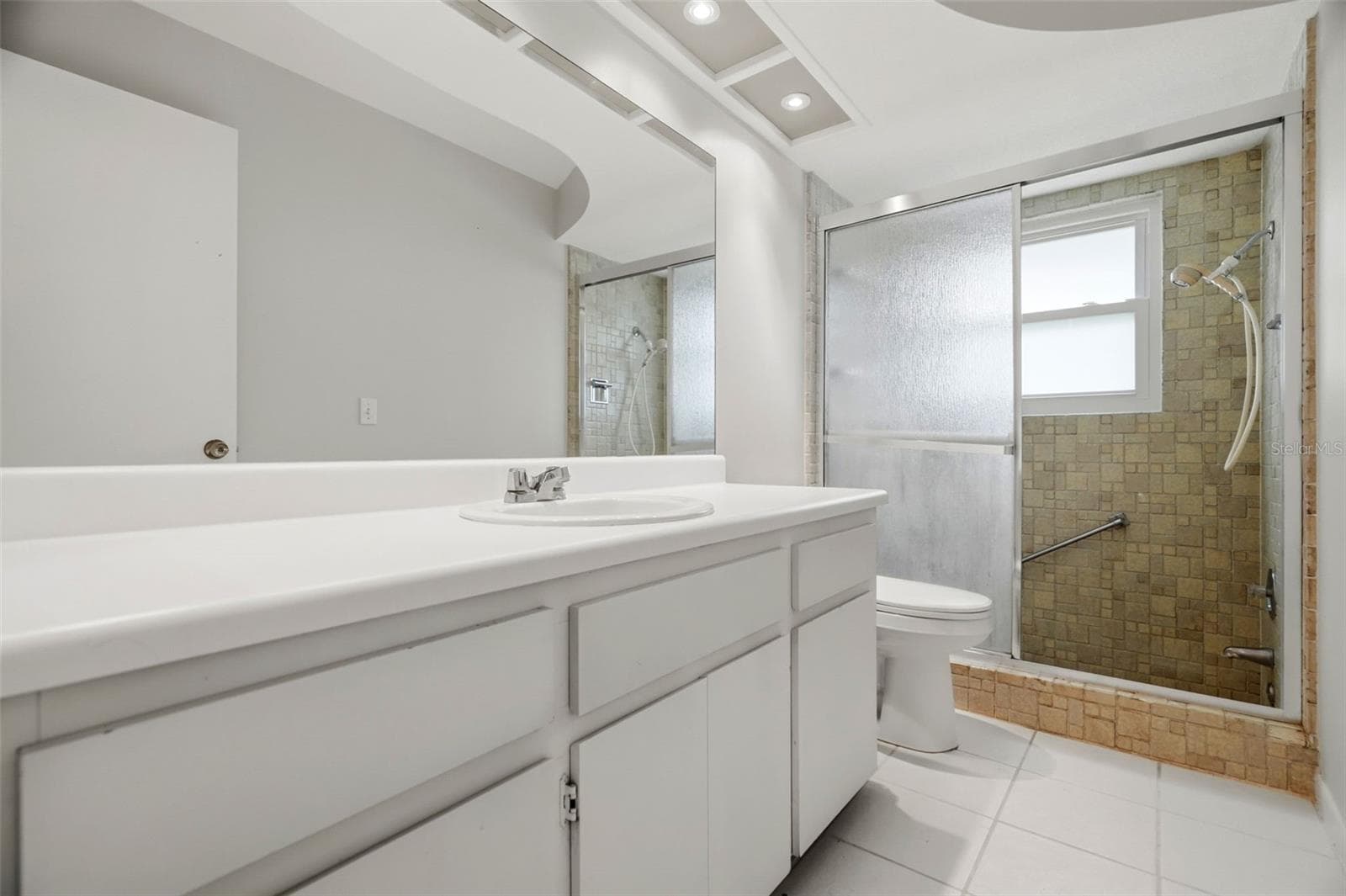 Main bathroom. - 1297 PEACH TREE DR, DUNEDIN