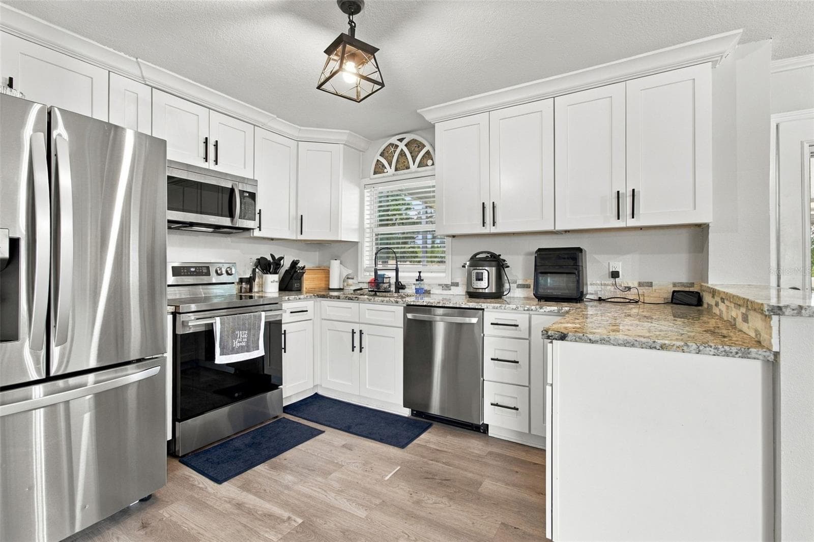 Single Family Residence at 335 COUNTRY CLUB DR, OLDSMAR, photo 2 of 52