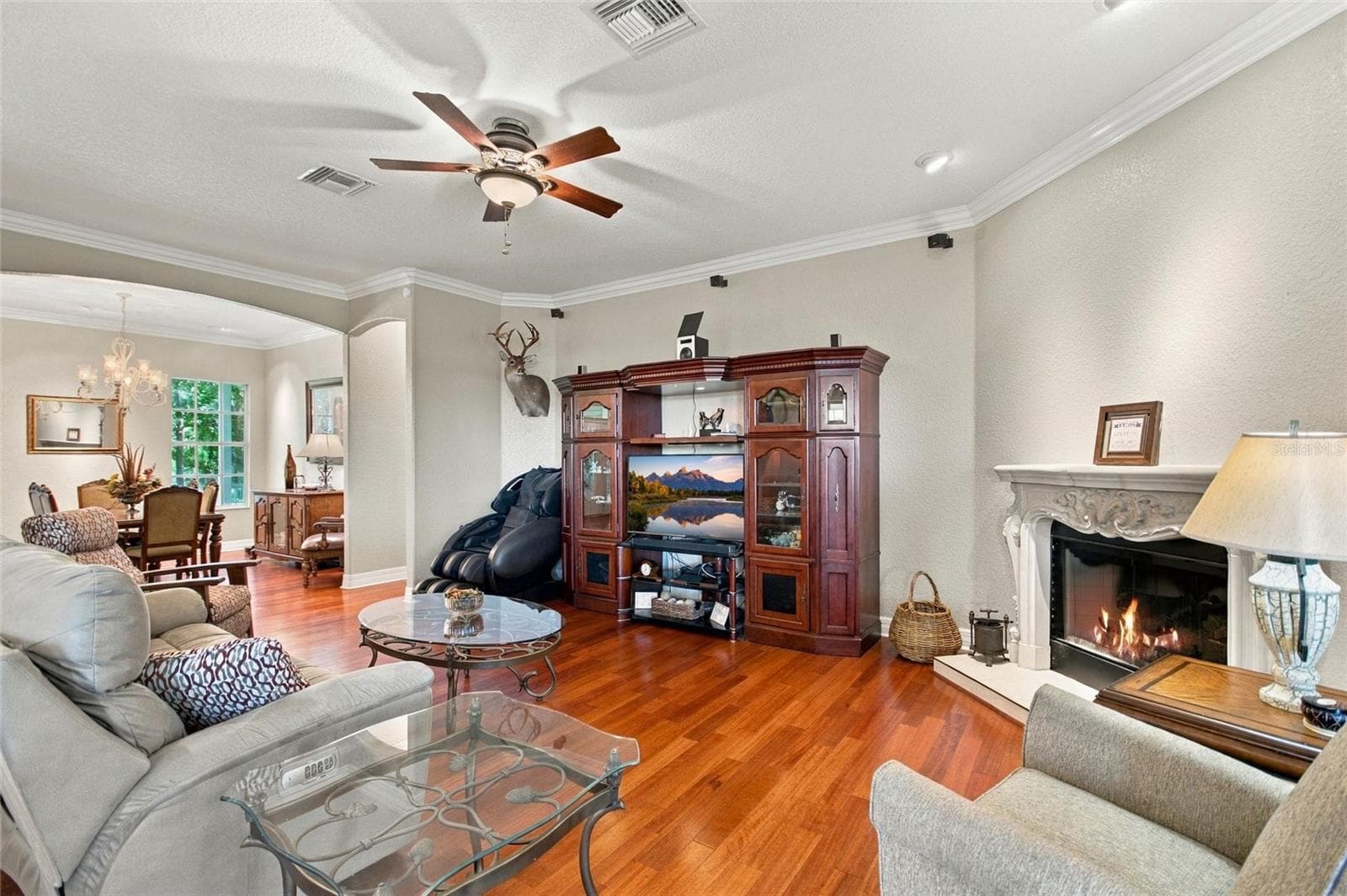 Look at those beautiful hardwood floors!  Gorgeous crown and base molding throughout the home. - 4108 N FORBES RD, PLANT CITY