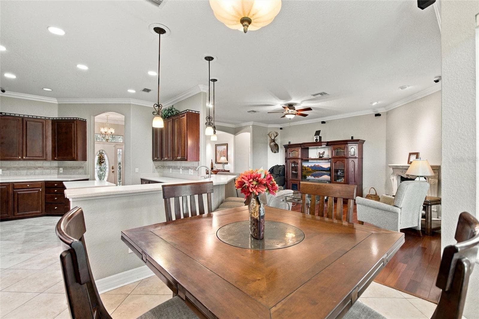 Dinette area looking back into kitchen and living area. - 4108 N FORBES RD, PLANT CITY