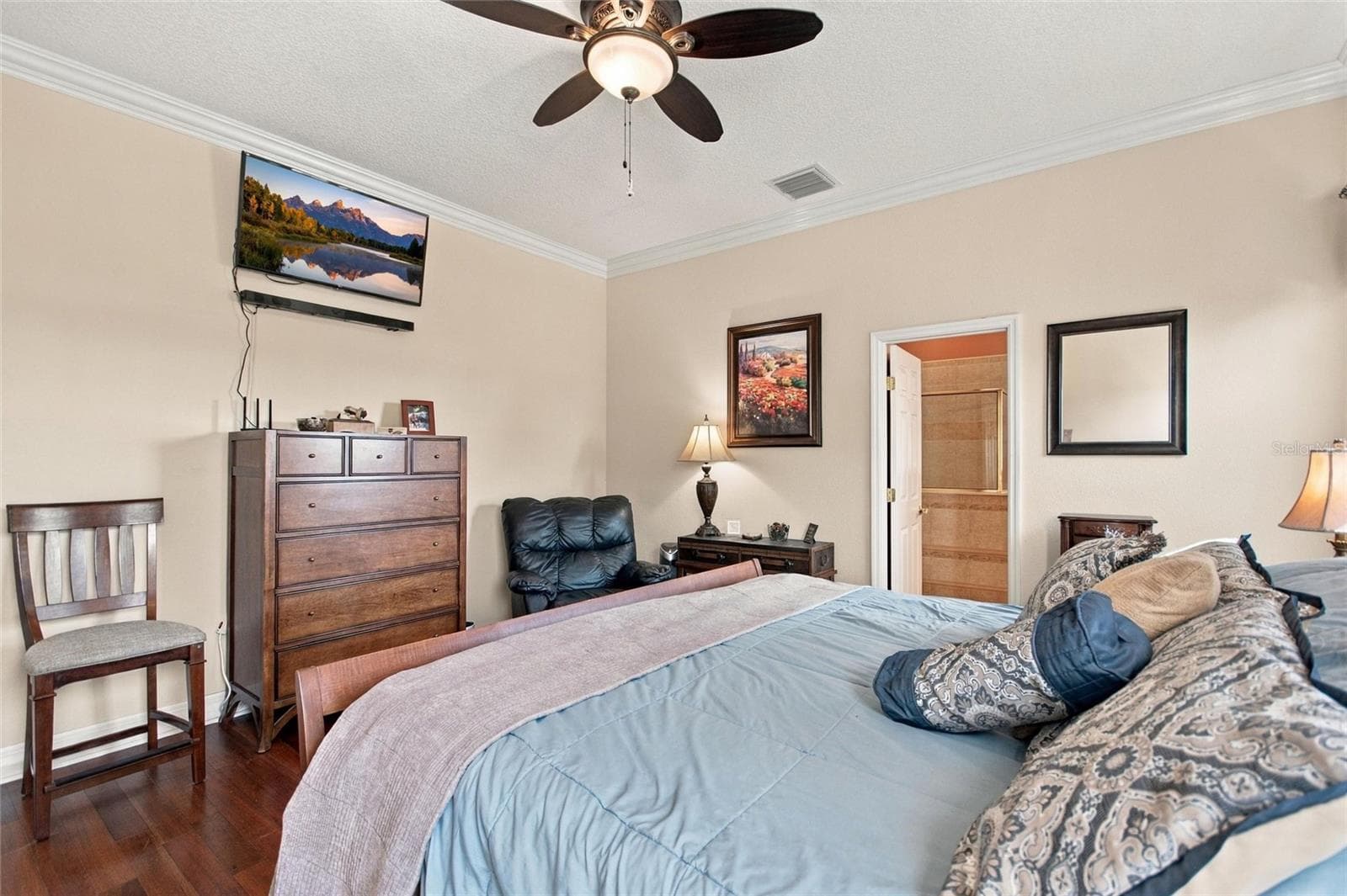 Primary bedroom with view into ensuite. - 4108 N FORBES RD, PLANT CITY