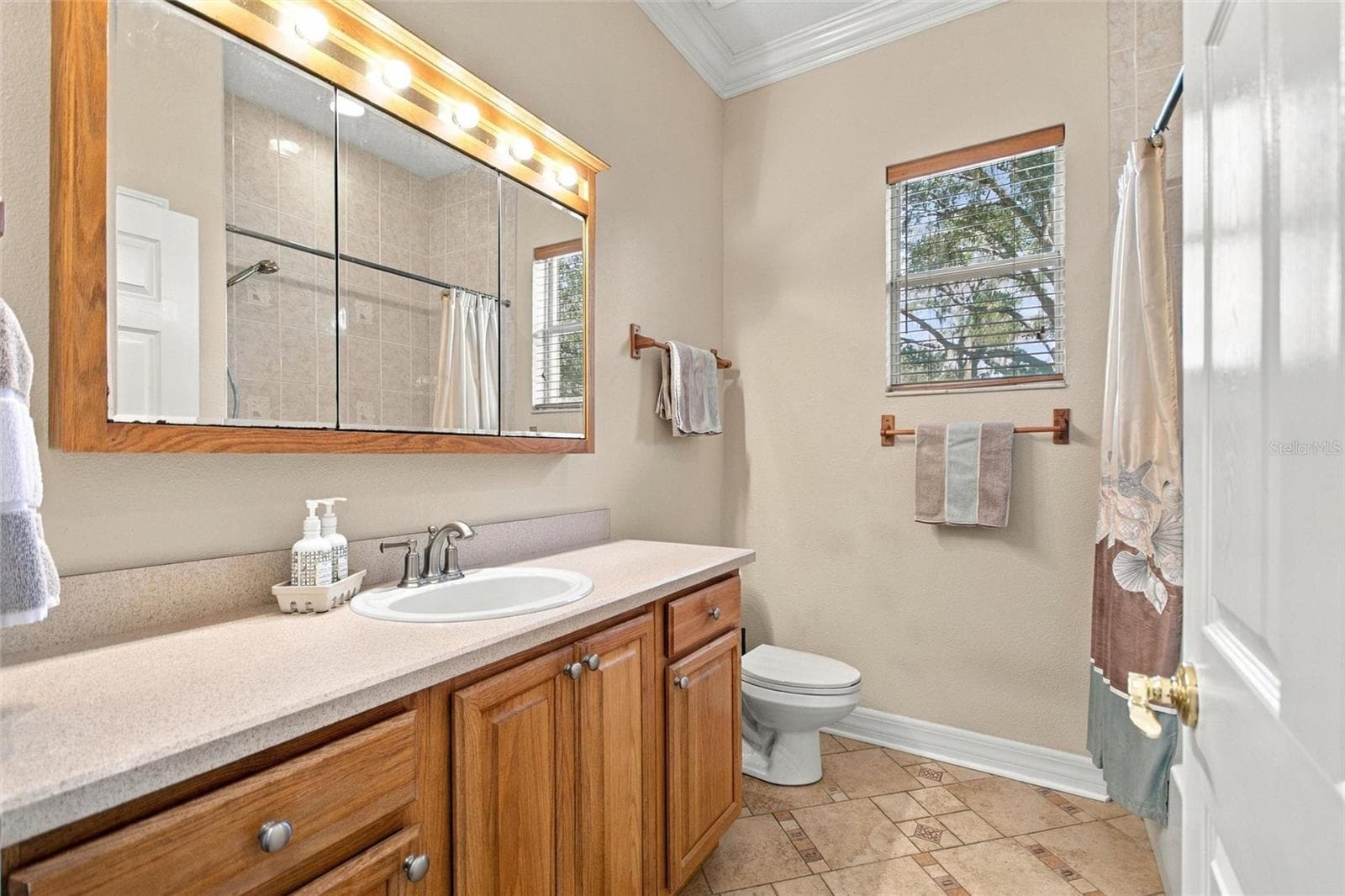 Guest bathroom is located between bedrooms 2 and 3. - 4108 N FORBES RD, PLANT CITY
