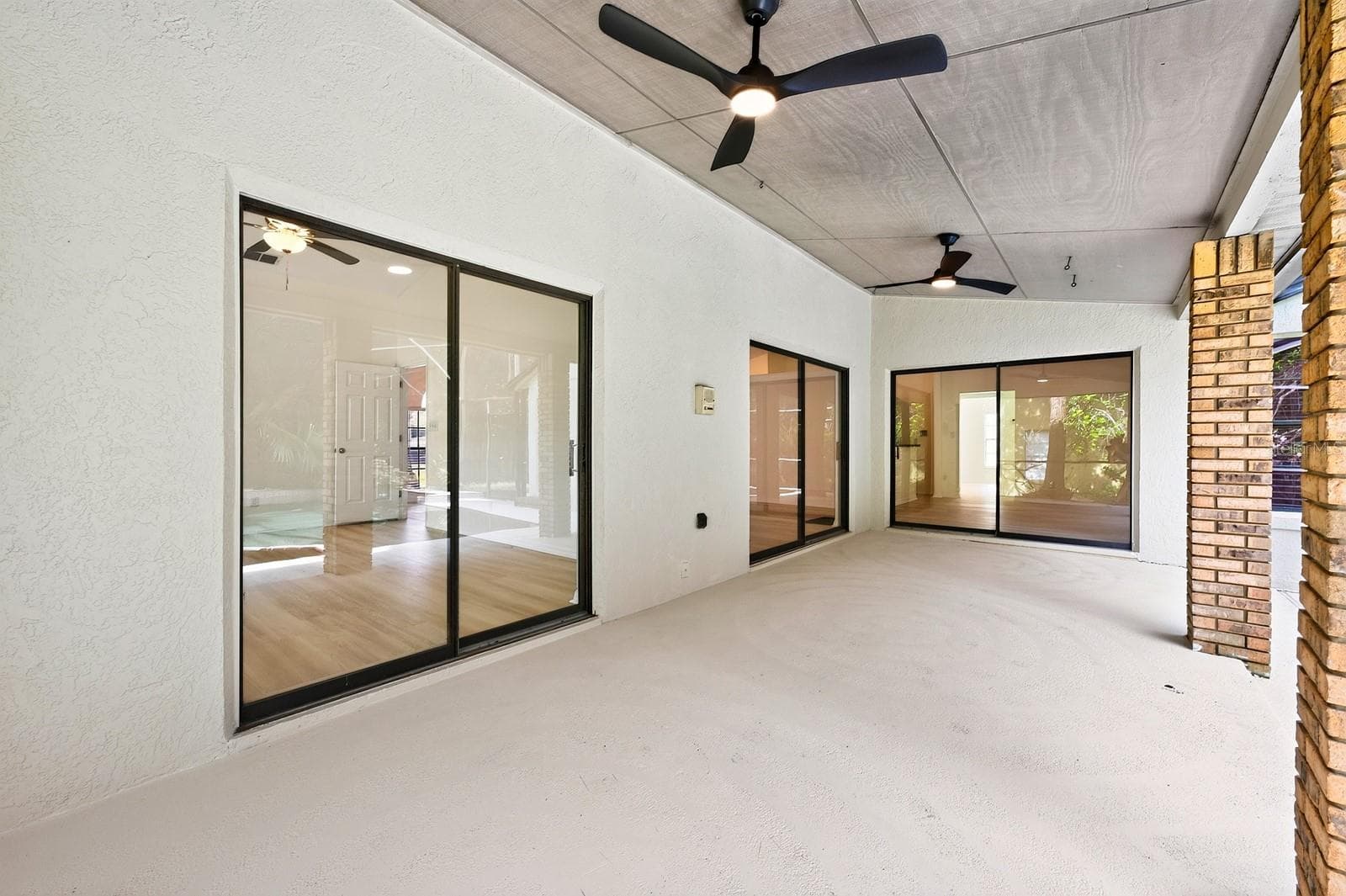Step outside to your own TROPICAL-INSPIRED BACKYARD RETREAT. - 1003 N MAGEE CREEK CT, OVIEDO