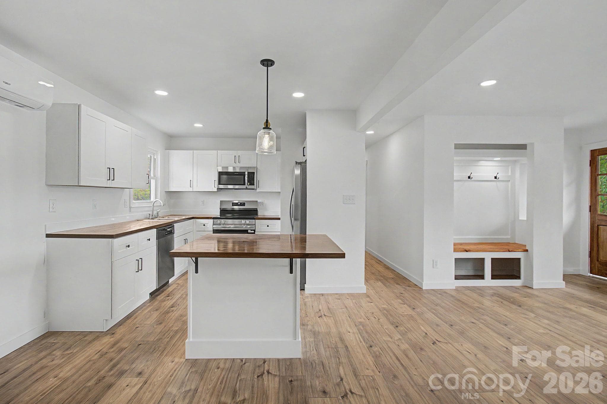 Open floor plan between kitchen and Living room perfect for entertaining. - 14 Kirby Place, Asheville