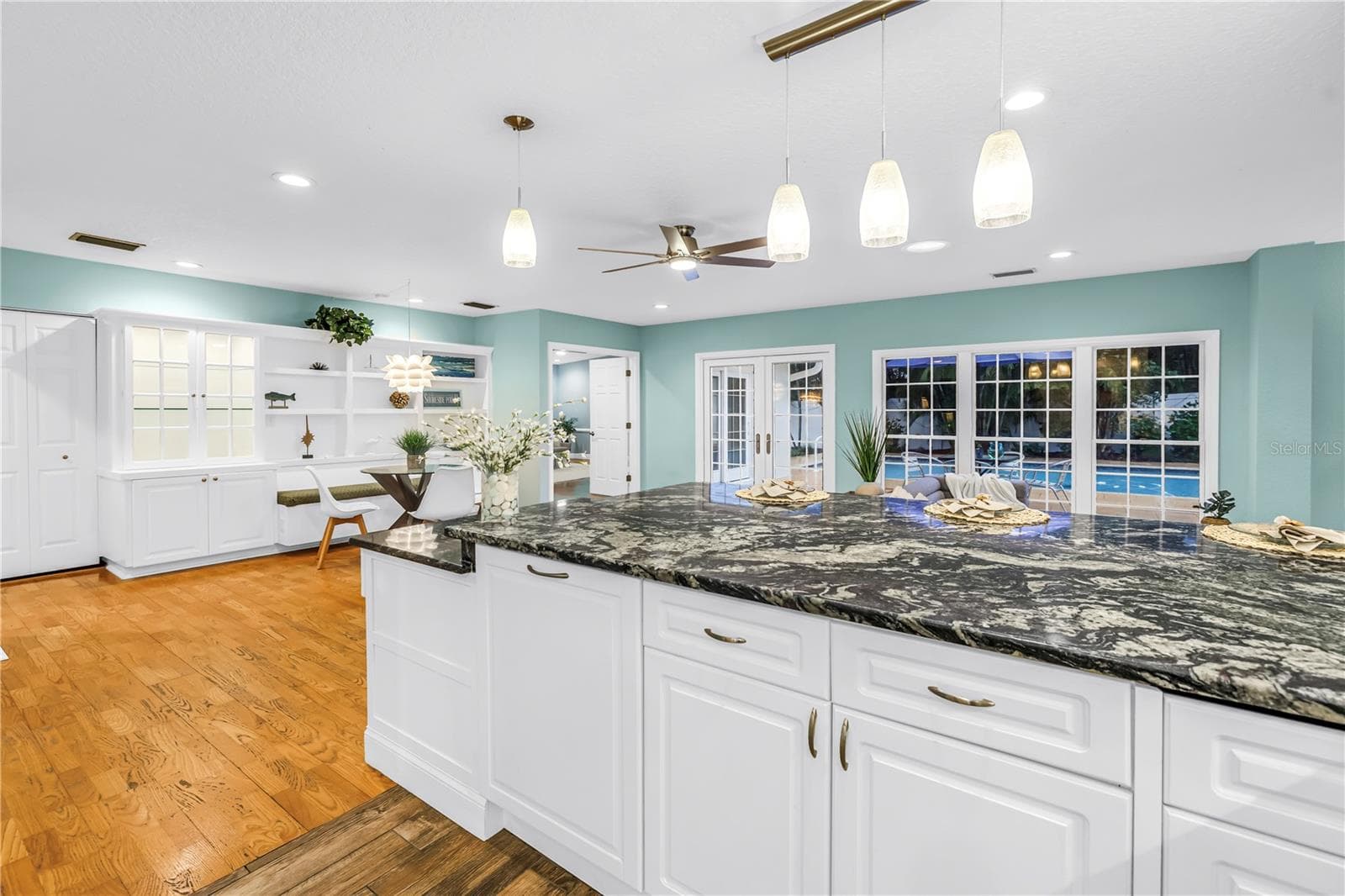 Chef’s view looking out toward the breakfast area and pool deck. - 146 GIRALDA BLVD NE, ST PETERSBURG