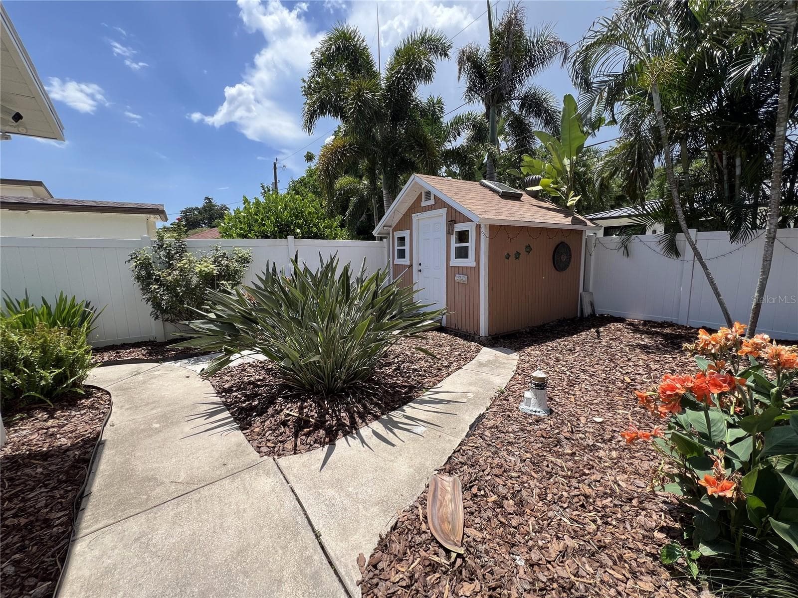 Check out this super organized gardener’s workshop! It’s got tons of natural light, totally secure for tools and, and it’s in new condition.  She Shed; He Shed; We Shed - 146 GIRALDA BLVD NE, ST PETERSBURG