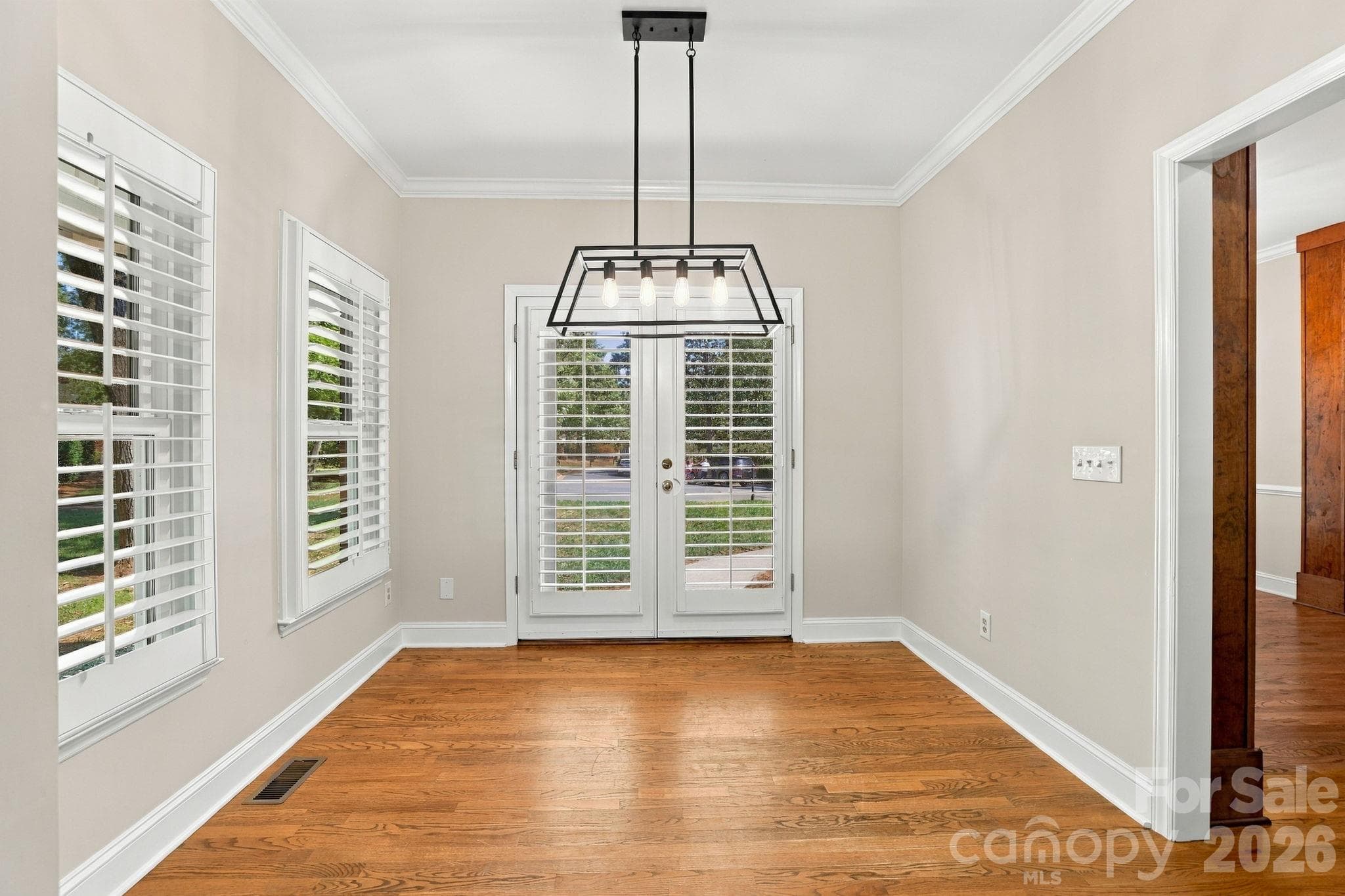 Breakfast RoomDouble Doors both open to porch1471 Porch Swing Lane Matthews, NC 28104 - 1471 Porch Swing Lane, Matthews