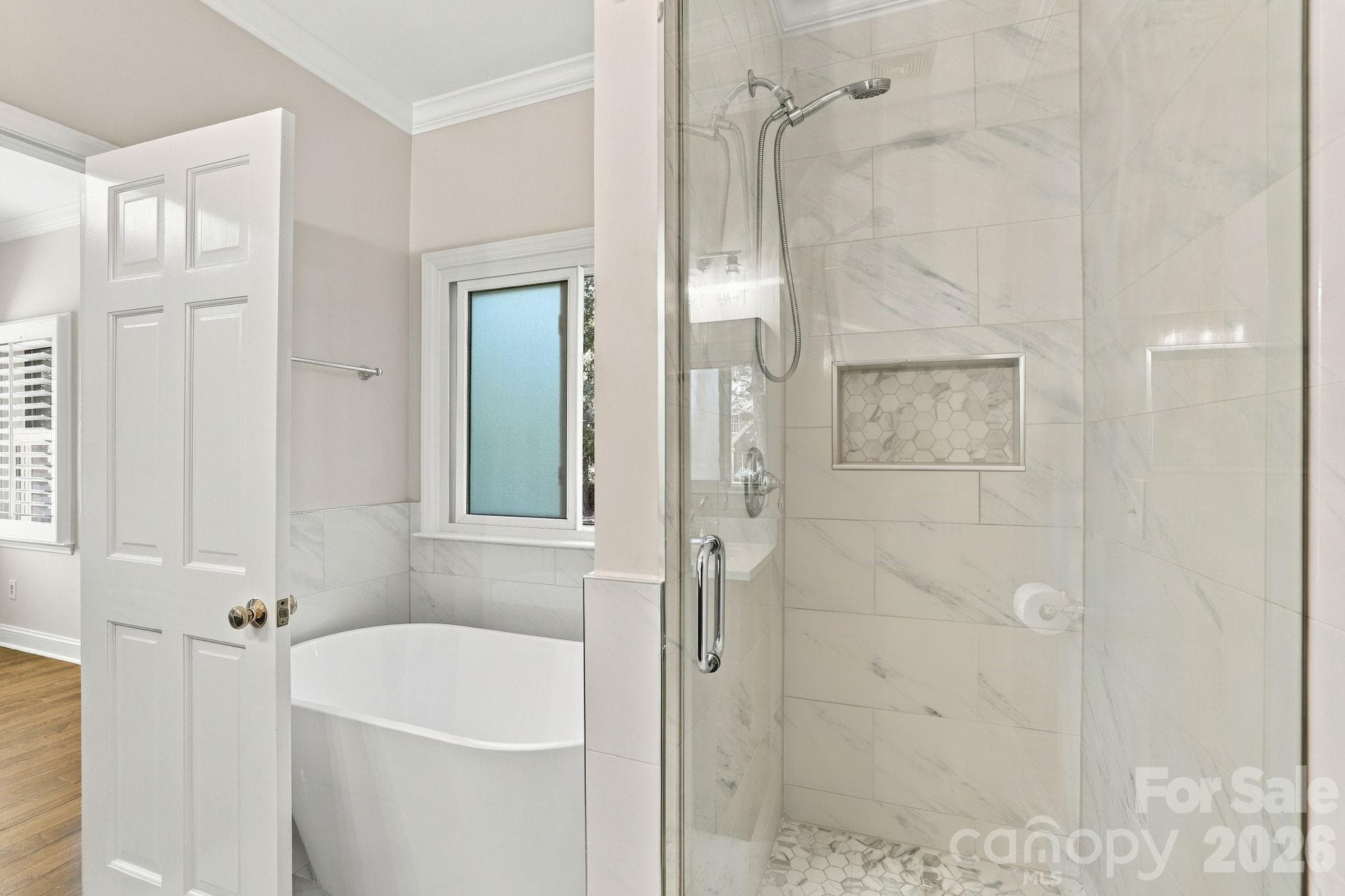 Primary Bathroom with Stand Alone Tub and Tiled Shower1471 Porch Swing Lane Matthews, NC 28104 - 1471 Porch Swing Lane, Matthews