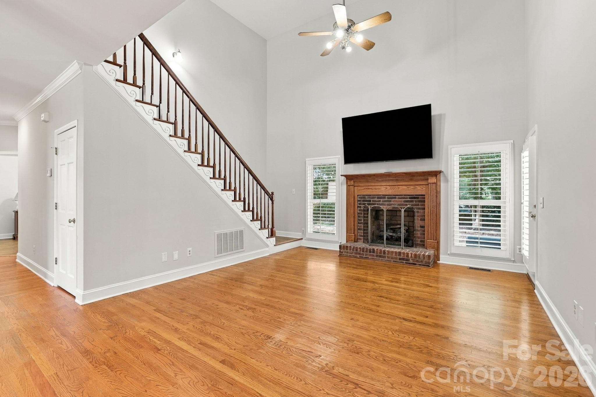 Great Room with Rear Staircase1471 Porch Swing Lane Matthews, NC 28104 - 1471 Porch Swing Lane, Matthews