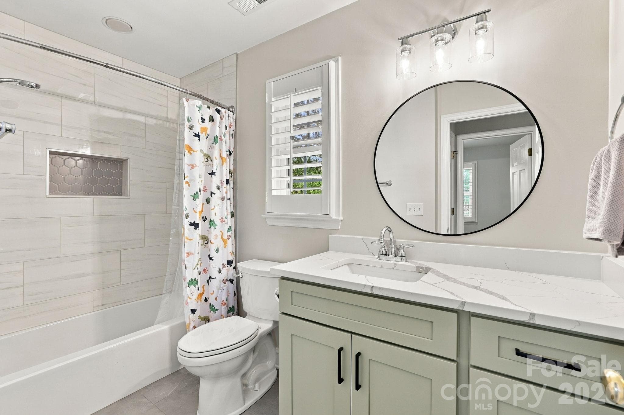 Hall Bath with new vanity and tiled surround1471 Porch Swing Lane Matthews, NC 28104 - 1471 Porch Swing Lane, Matthews