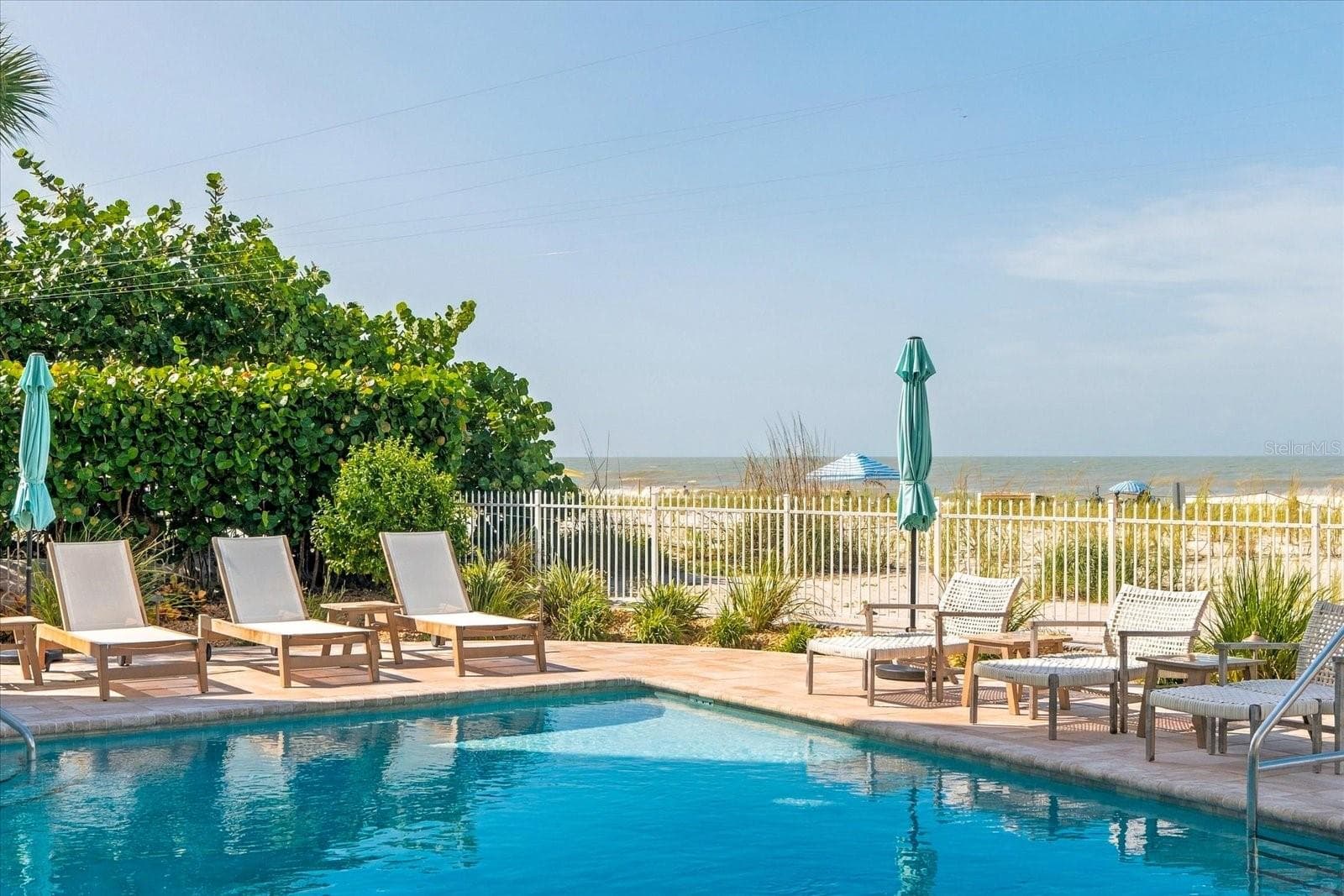 Sparkling pool and spa - 19600 GULF BLVD #301, INDIAN SHORES