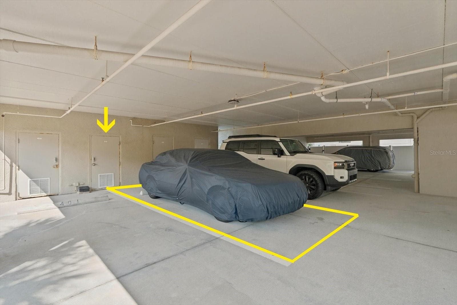 Covered assigned parking space - 19600 GULF BLVD #301, INDIAN SHORES