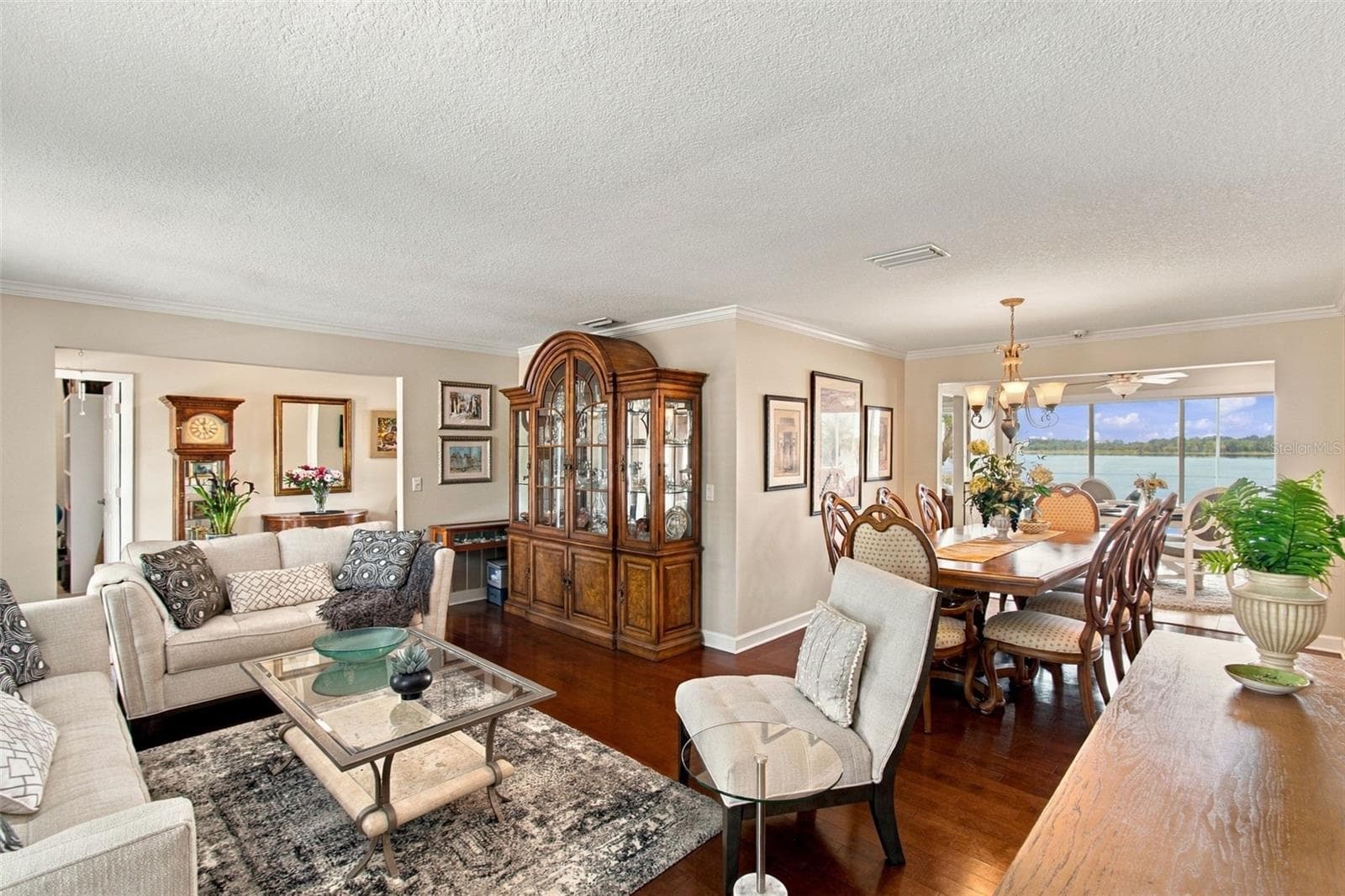 Formal living room & dining room - Hardwood flooring - 1921 MANOR CIR SE, WINTER HAVEN