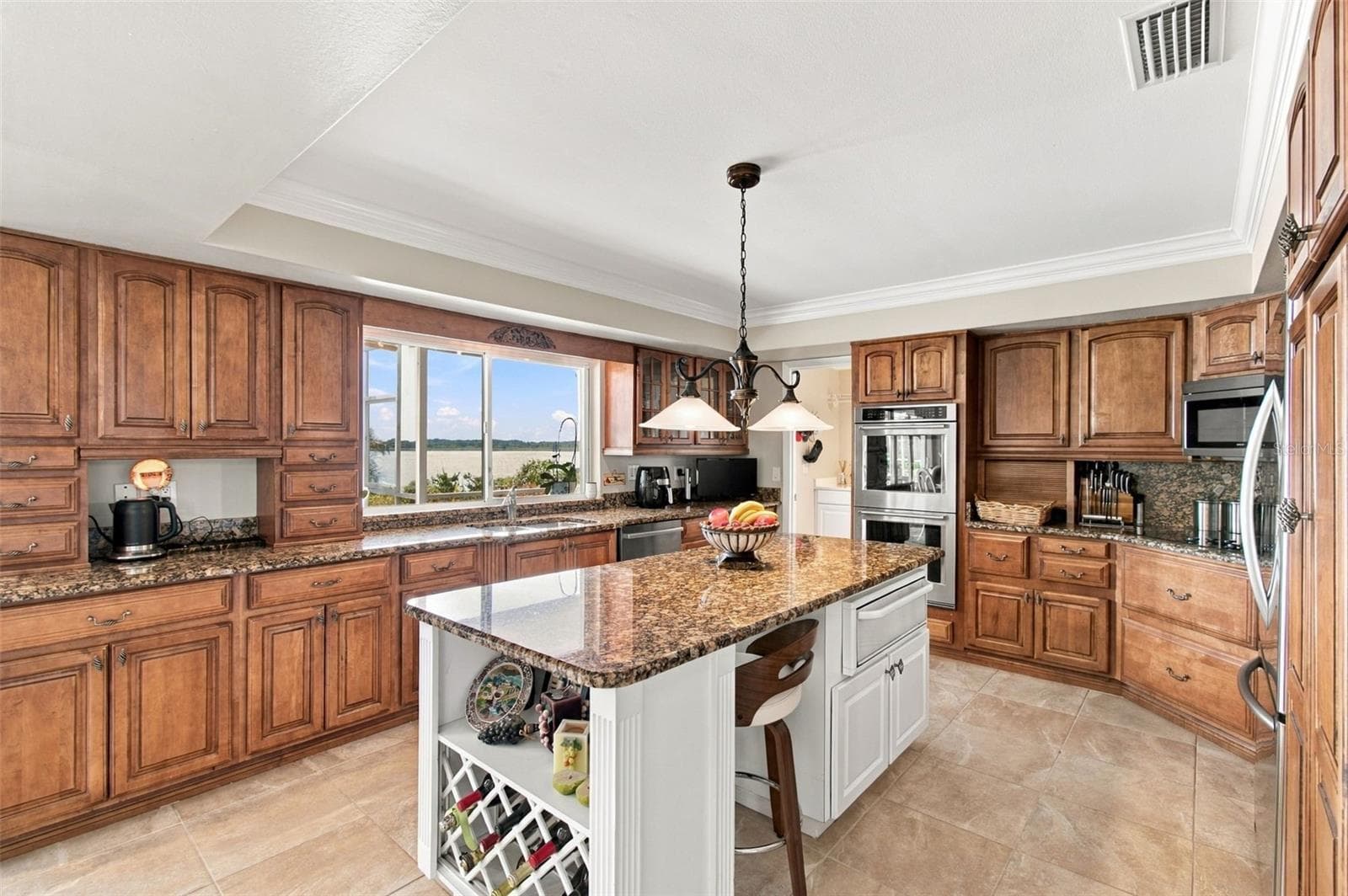 Lakeview custom island kitchen - Updated Stainless appliances - 1921 MANOR CIR SE, WINTER HAVEN