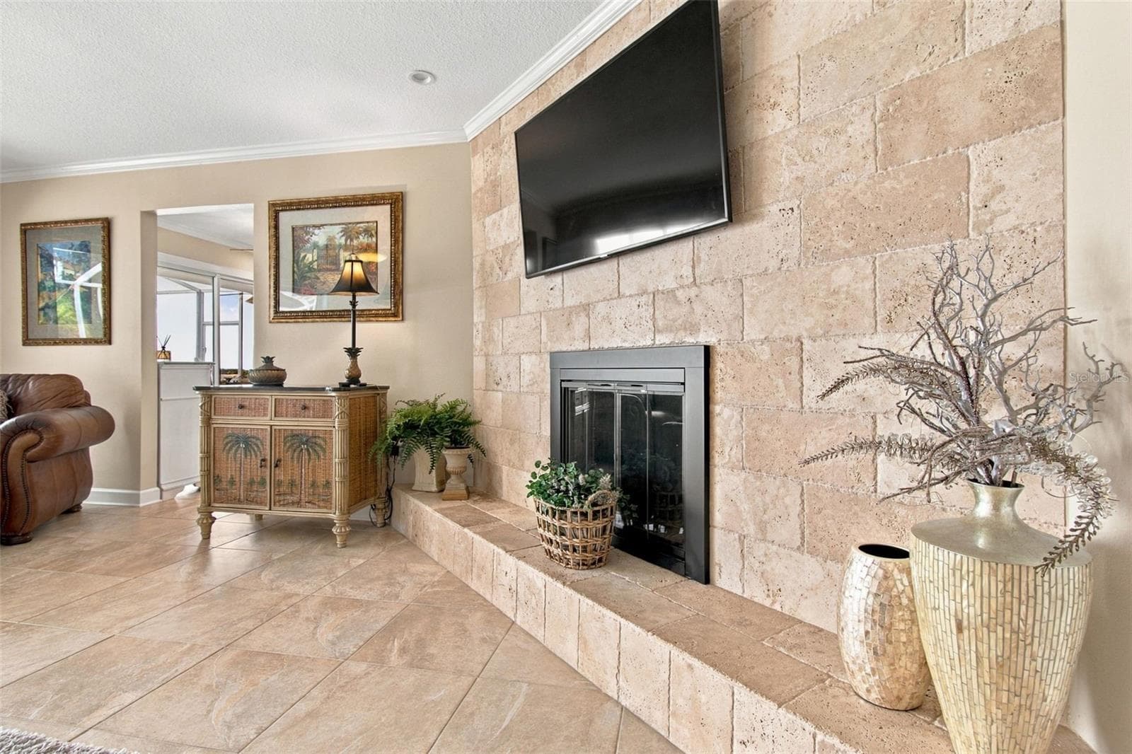 Family room - wood burning fireplace - 1921 MANOR CIR SE, WINTER HAVEN