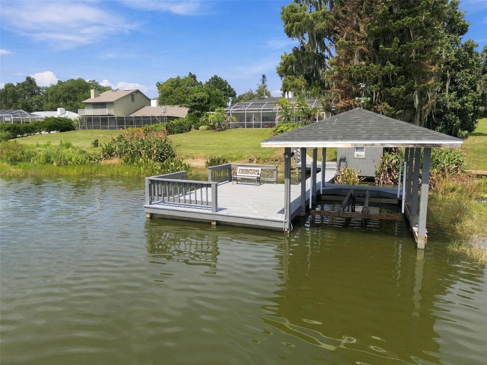 Dock & boathouse with lift - 1921 MANOR CIR SE, WINTER HAVEN