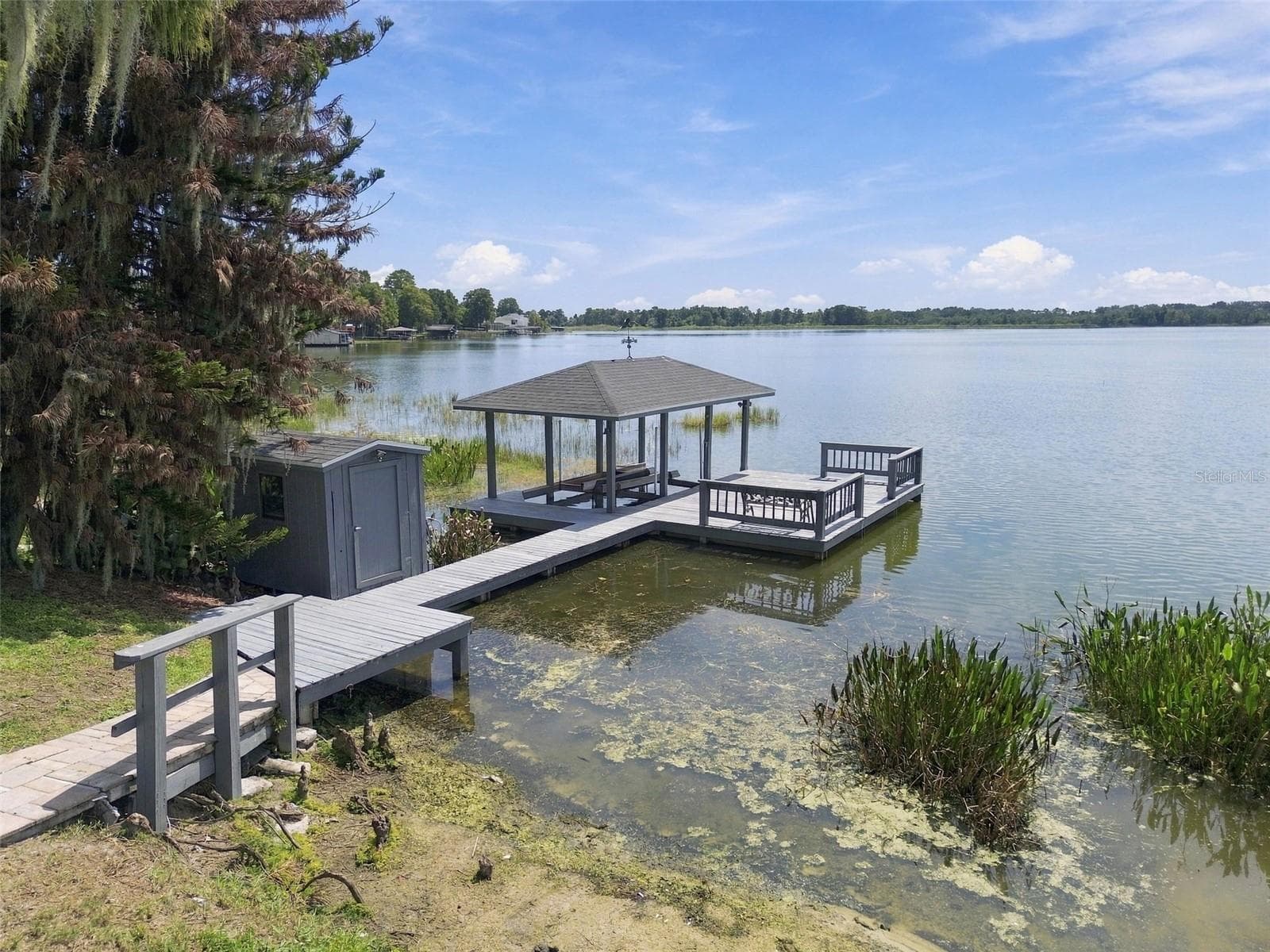 Dock & boathouse with lift - 1921 MANOR CIR SE, WINTER HAVEN