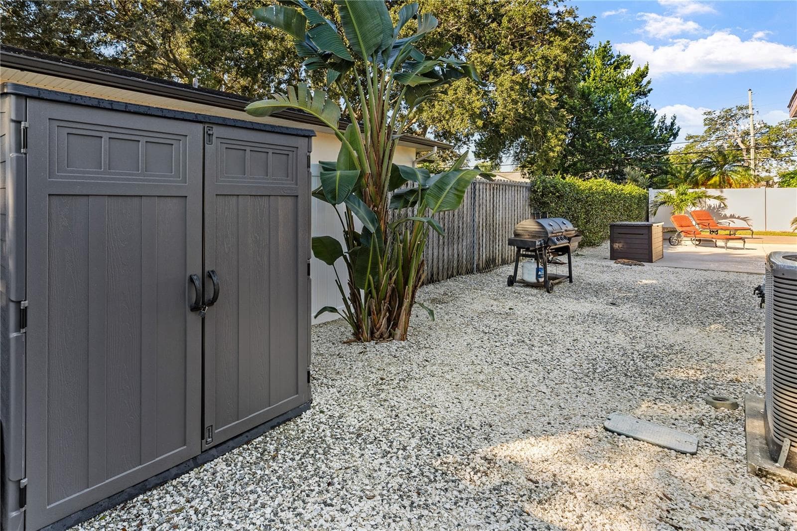 Hardscape side of house - 1324 WHITACRE DR, CLEARWATER