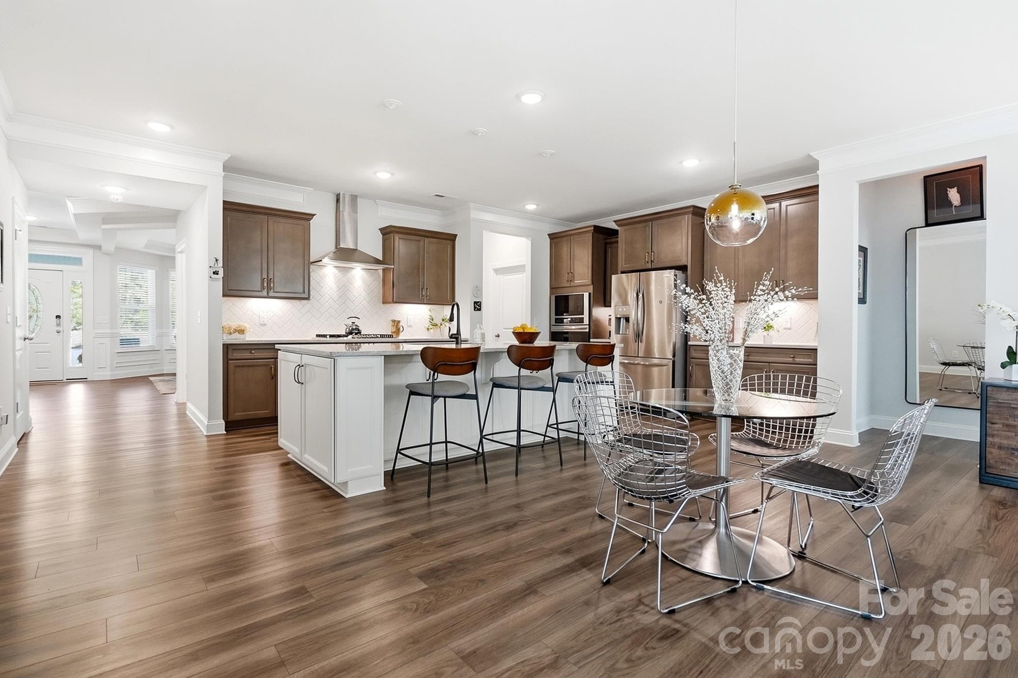 Gourmet kitchen with on trend Burlap and antique whitecabinetry and oil rubbed fixtures! - 2014 Old Evergreen Parkway, Indian Trail