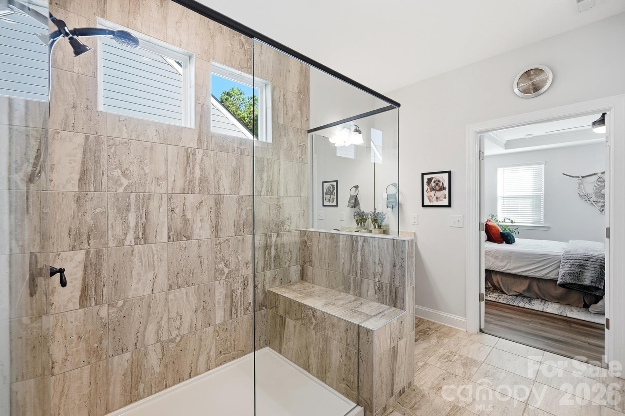 Large shower with subway tile, built-in bench and additional transom window for natural light - 2014 Old Evergreen Parkway, Indian Trail