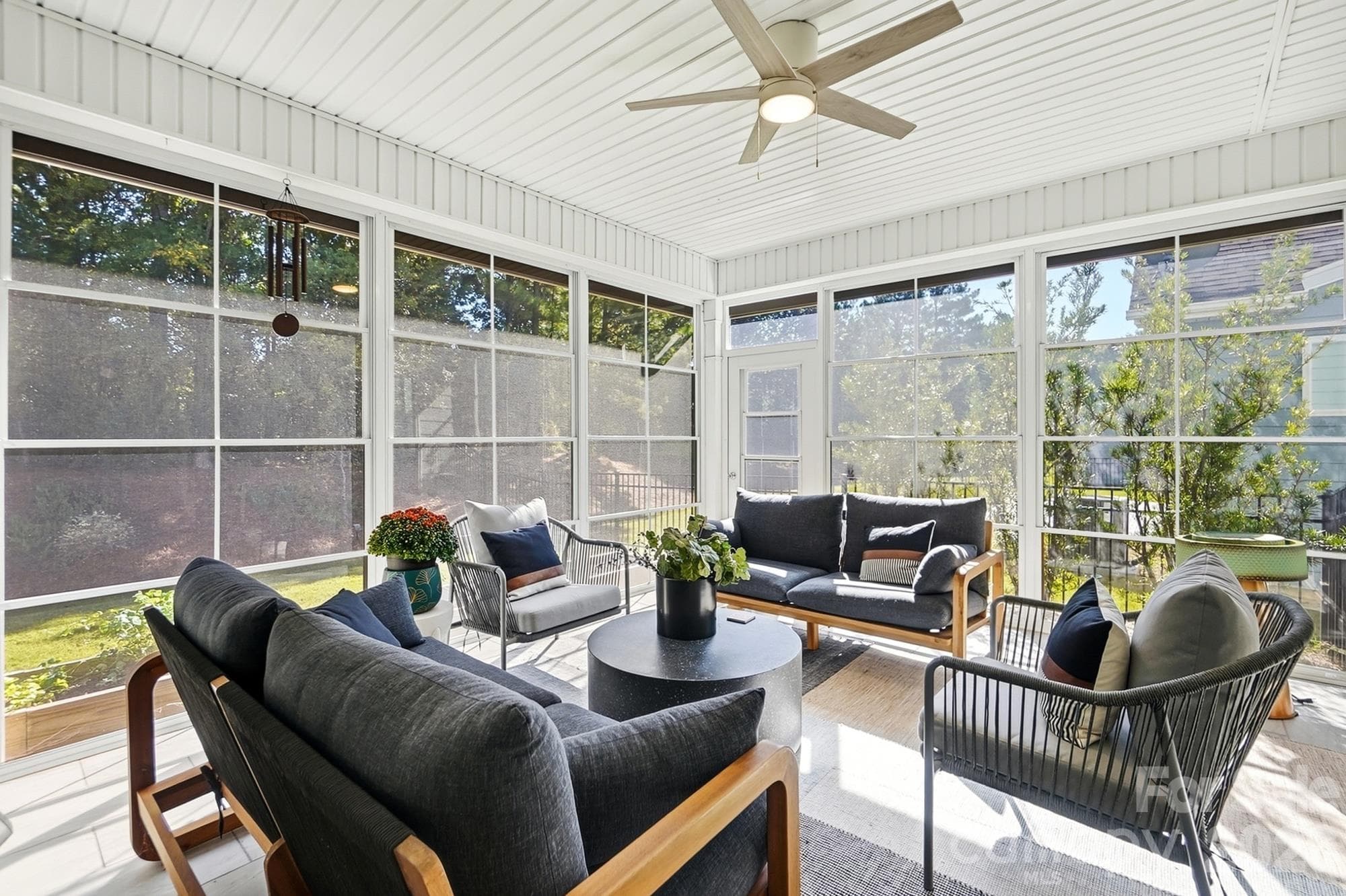 Relax in 3 season room with Eze Breeze window and auto shades - 2014 Old Evergreen Parkway, Indian Trail