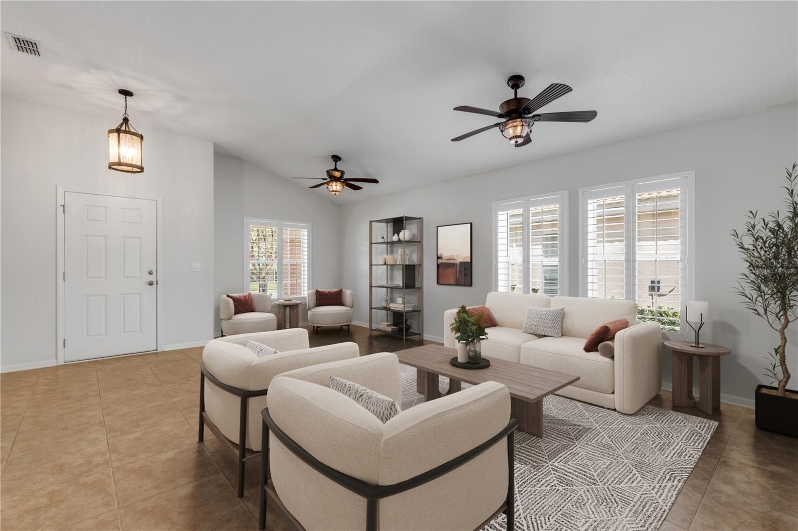 Virtually Staged Living Room showing size and openness. - 3450 VELONA AVE, NEW SMYRNA BEACH