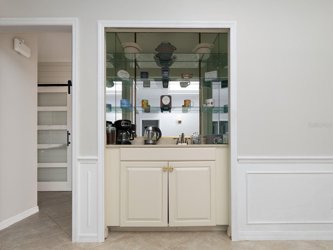 Wet bar in dining room - 71 CAYMAN ISLES BLVD, ENGLEWOOD