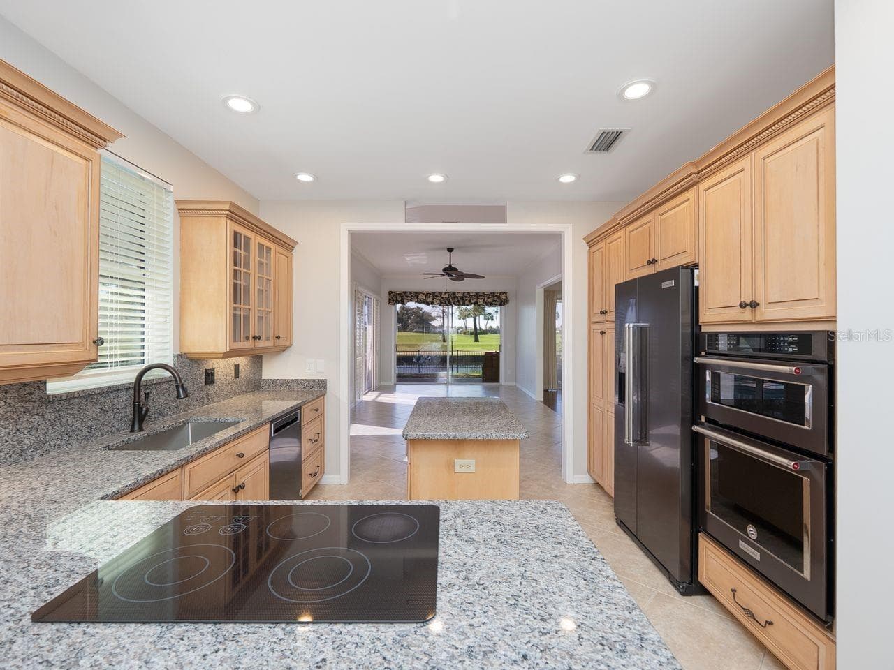 Kitchen looking toward family room - 71 CAYMAN ISLES BLVD, ENGLEWOOD