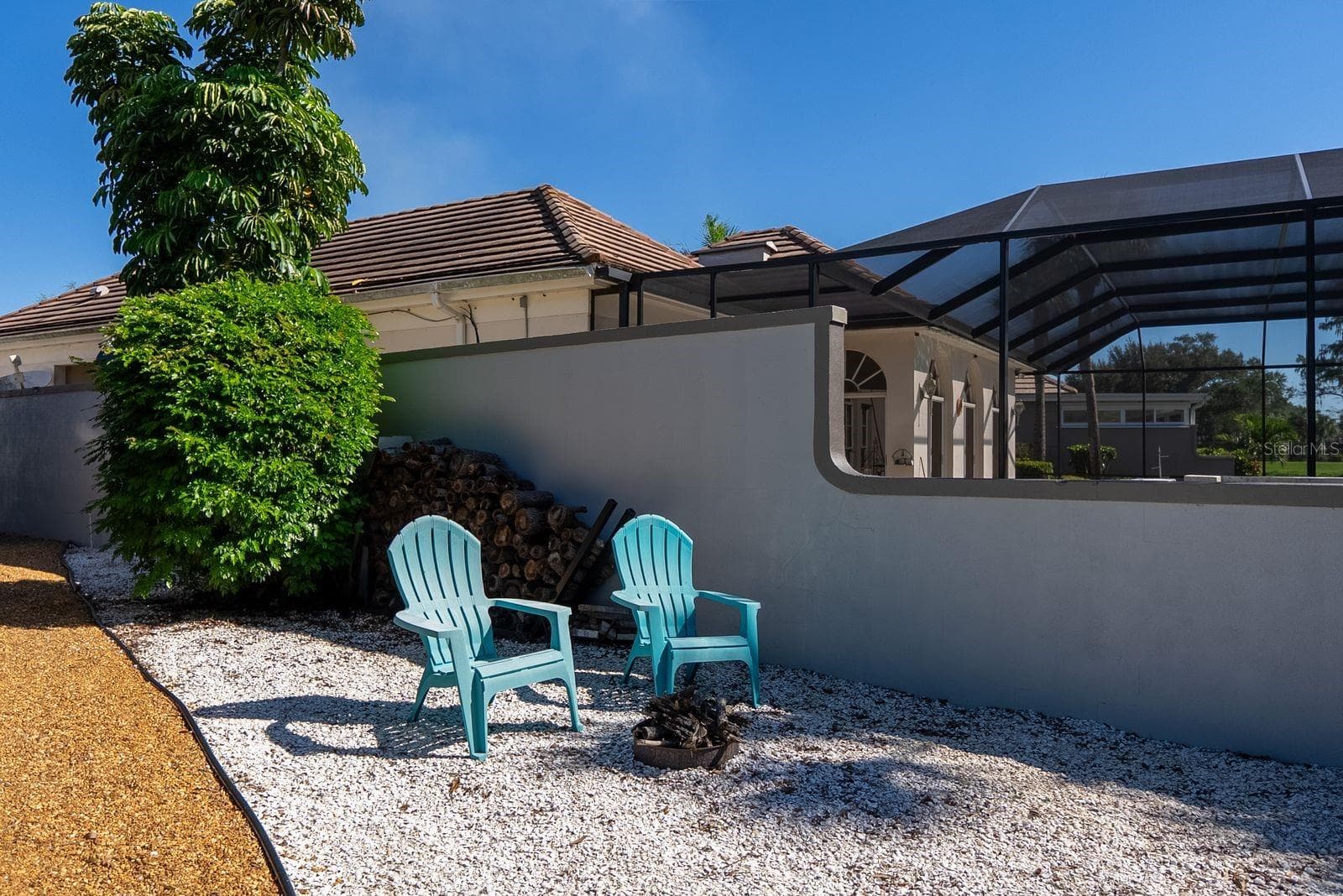 fire pit on side of house - 71 CAYMAN ISLES BLVD, ENGLEWOOD