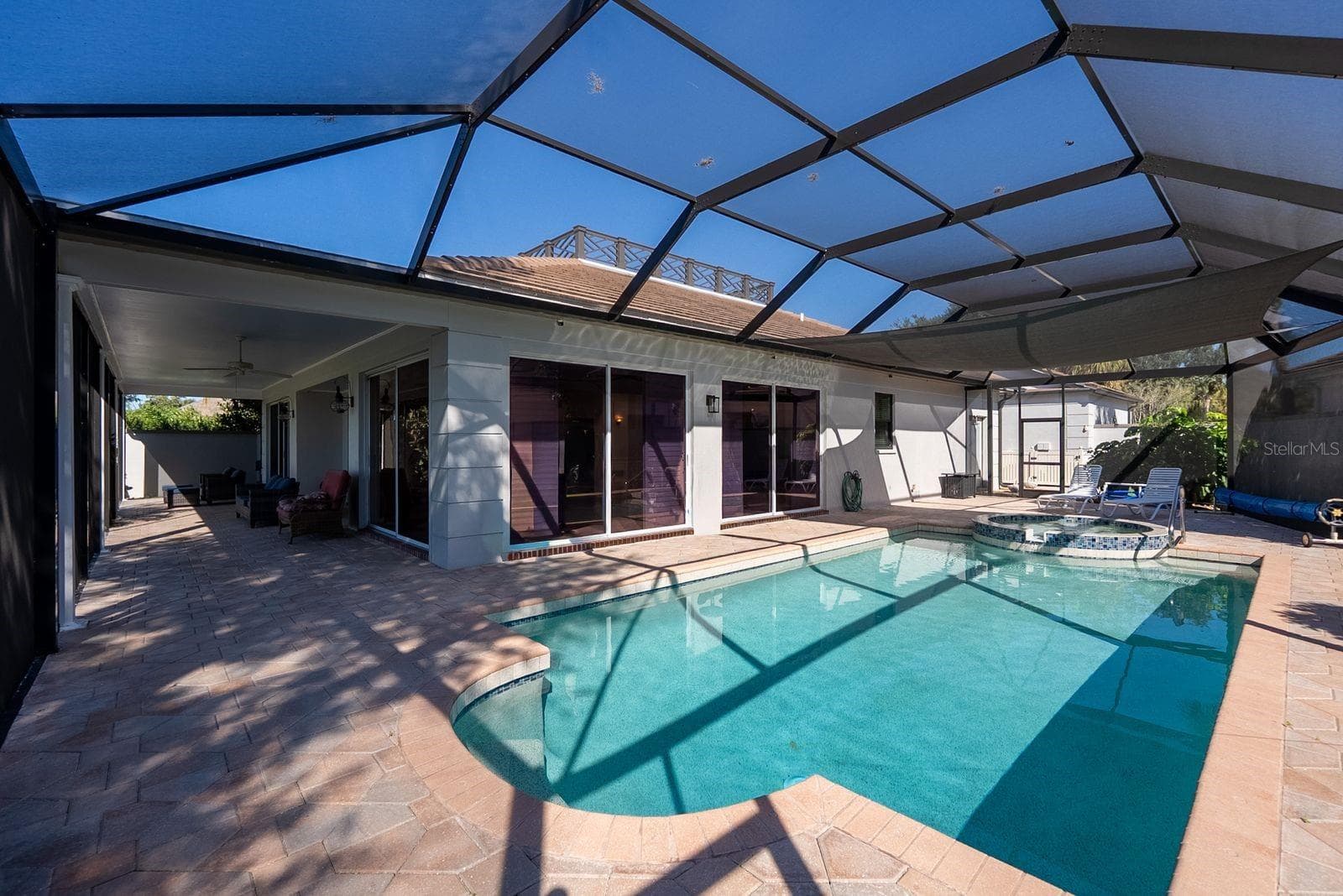 Pool area patio on side wraps around to back patio - 71 CAYMAN ISLES BLVD, ENGLEWOOD