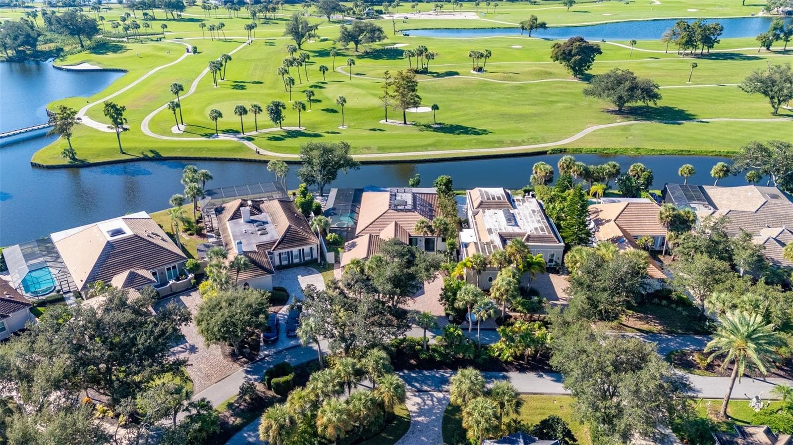 aerial of house on golf course and pond - 71 CAYMAN ISLES BLVD, ENGLEWOOD