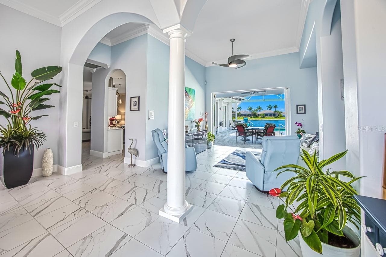 Entry opens to Living Room and lanai - 8625 SOUTHWIND BAY CIR, FORT MYERS