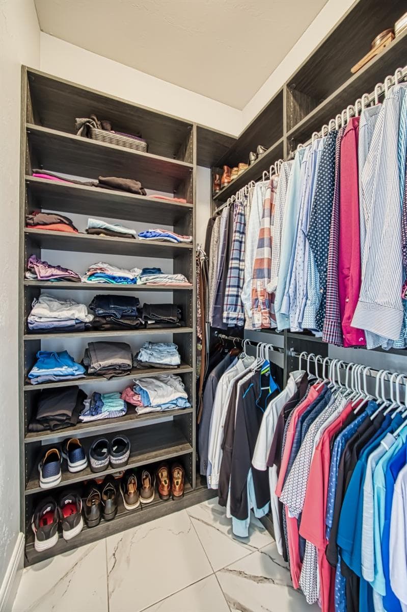 Built in his/hers wood shelving - 8625 SOUTHWIND BAY CIR, FORT MYERS