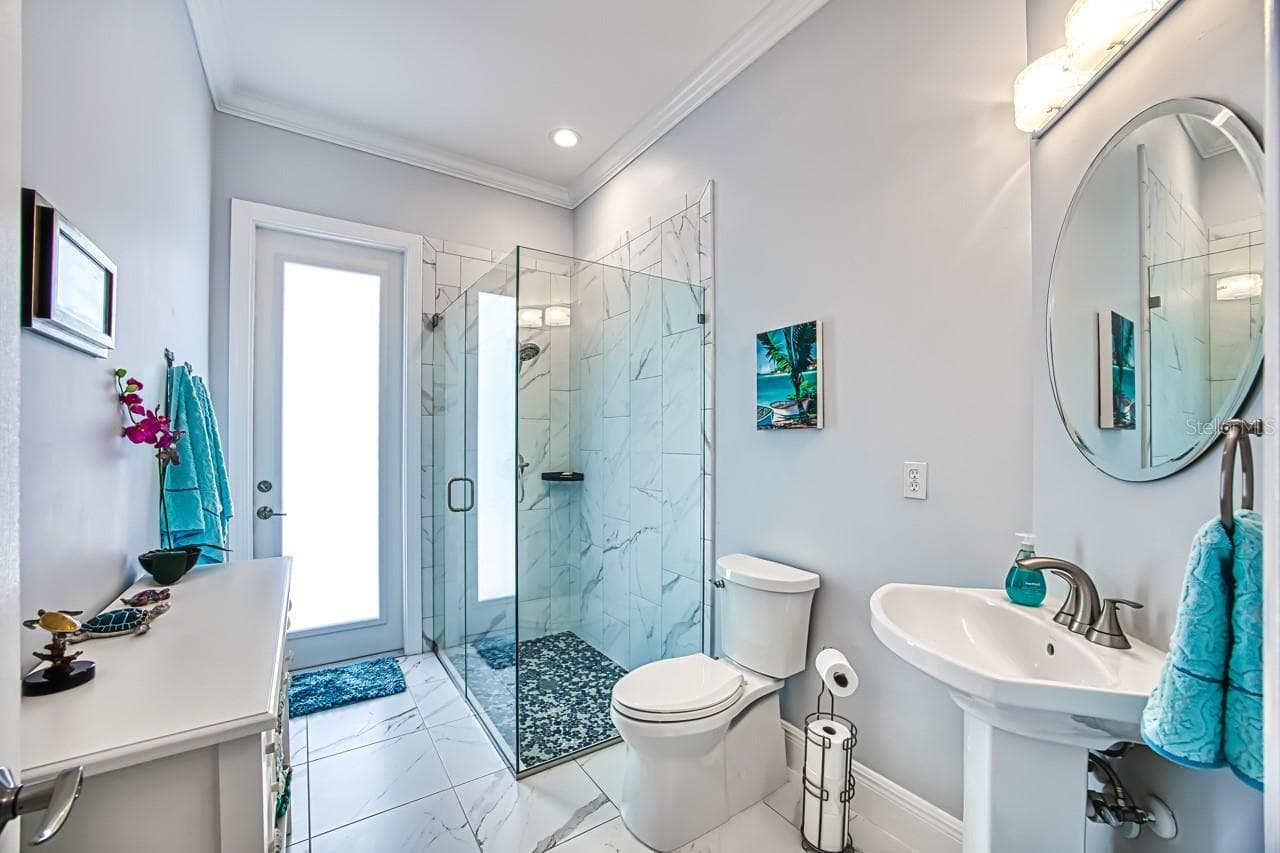 3rd full bathroom - that opens to the pool lanai - 8625 SOUTHWIND BAY CIR, FORT MYERS