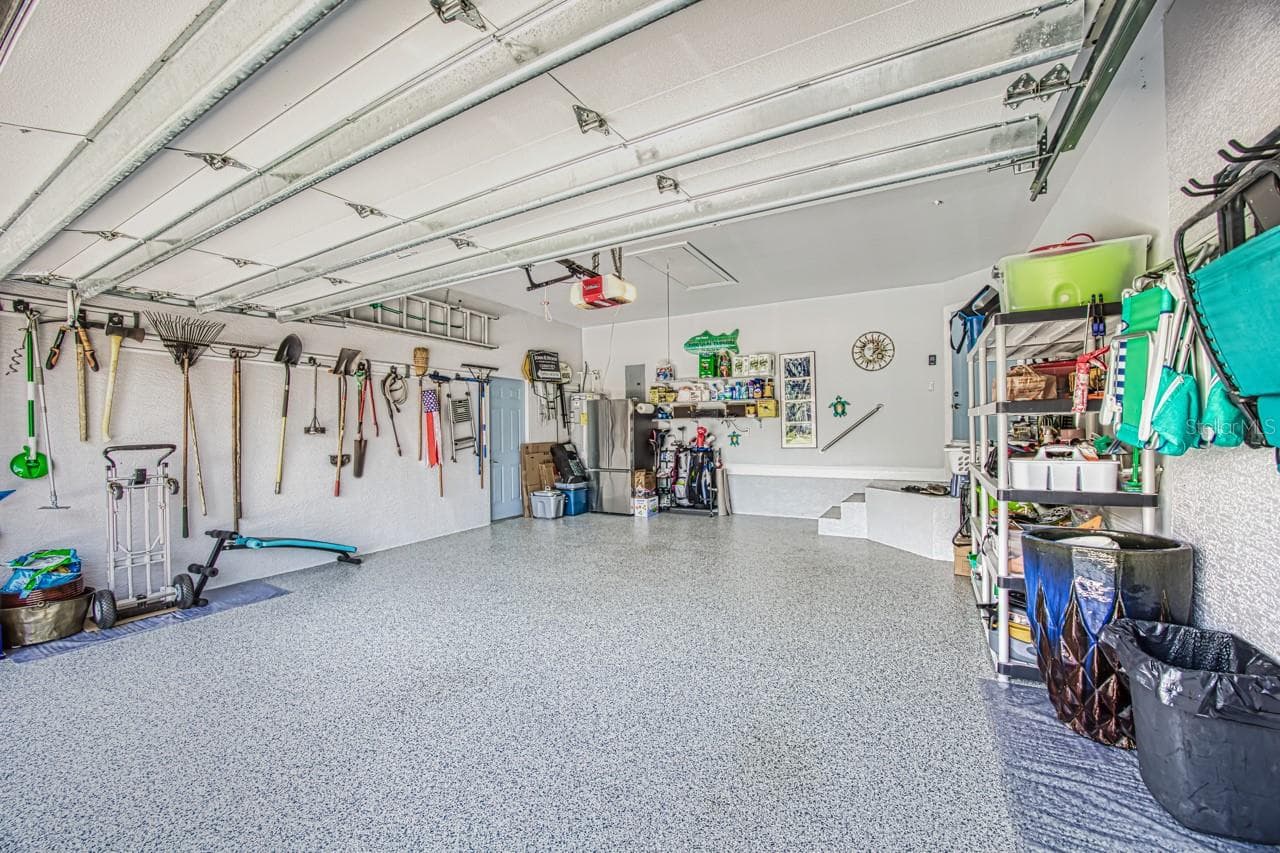 Custom Epoxy coated floor - 8625 SOUTHWIND BAY CIR, FORT MYERS