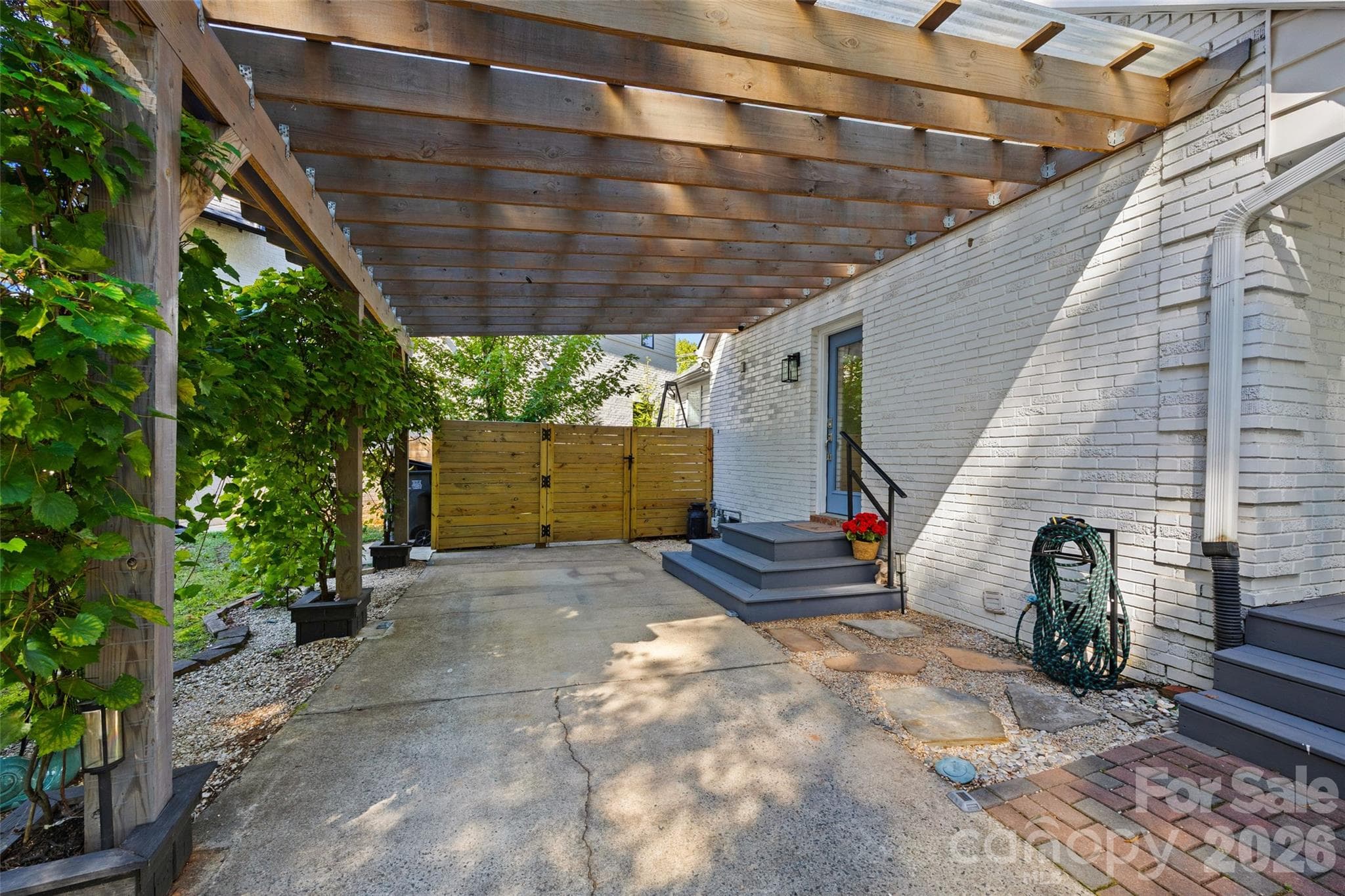 Covered parking with side entrance - 5145 Murrayhill Drive, Charlotte