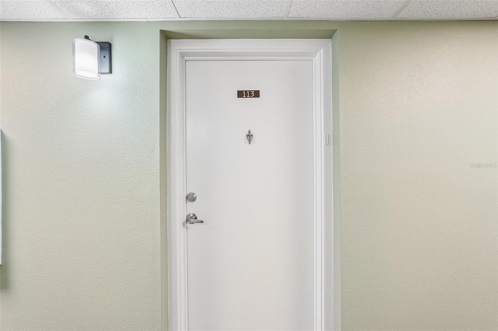 Front door from hallway - 21280 BRINSON AVE #113, PORT CHARLOTTE
