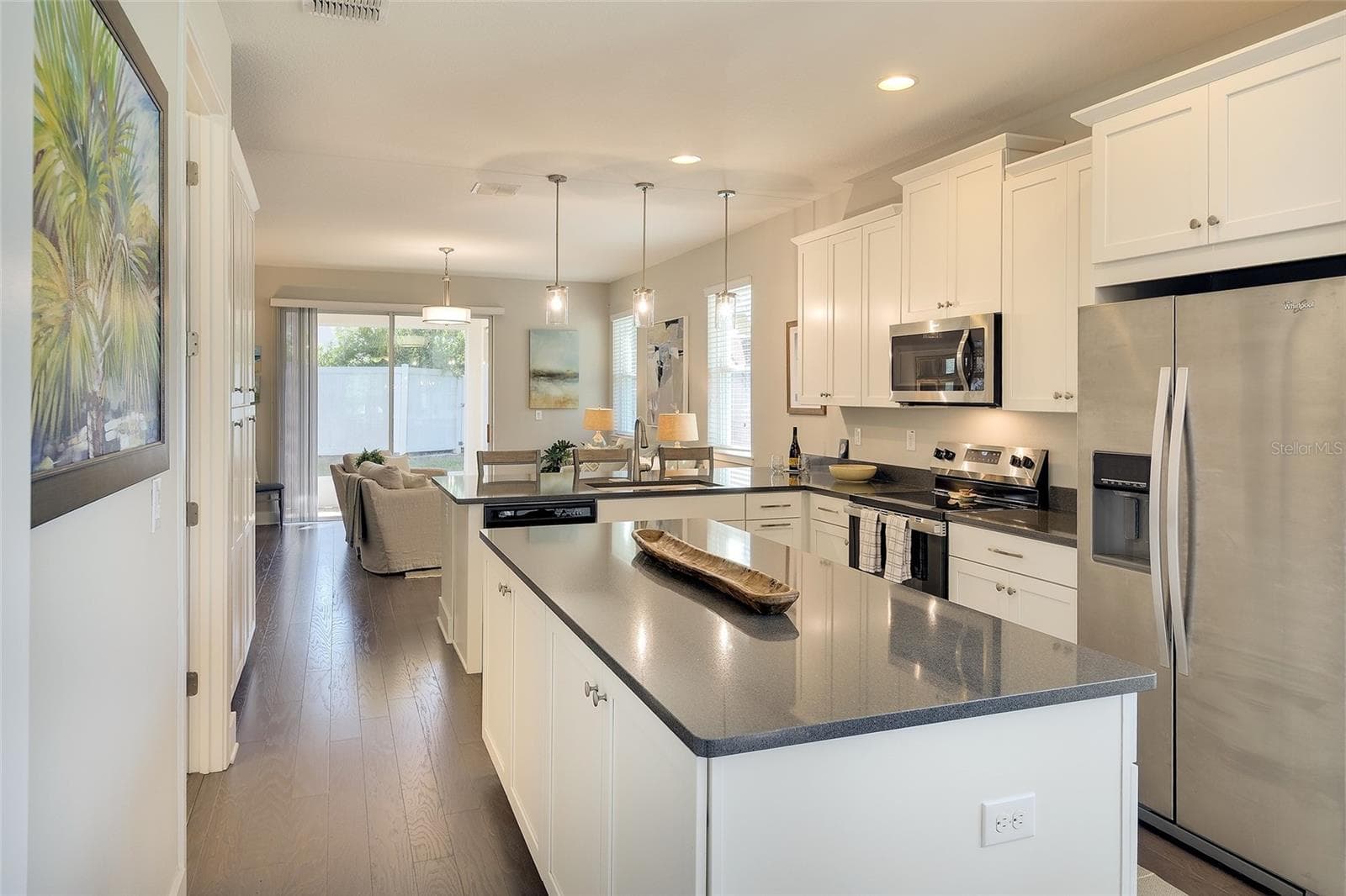 Great storage with 42" uppers, designer cabinetry, dbl pantry and island cabinets! - 5048 COURSE DR, SARASOTA