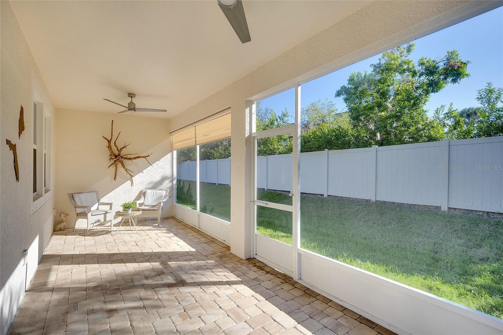 Expanded covered lanai, screened with private view. - 5048 COURSE DR, SARASOTA