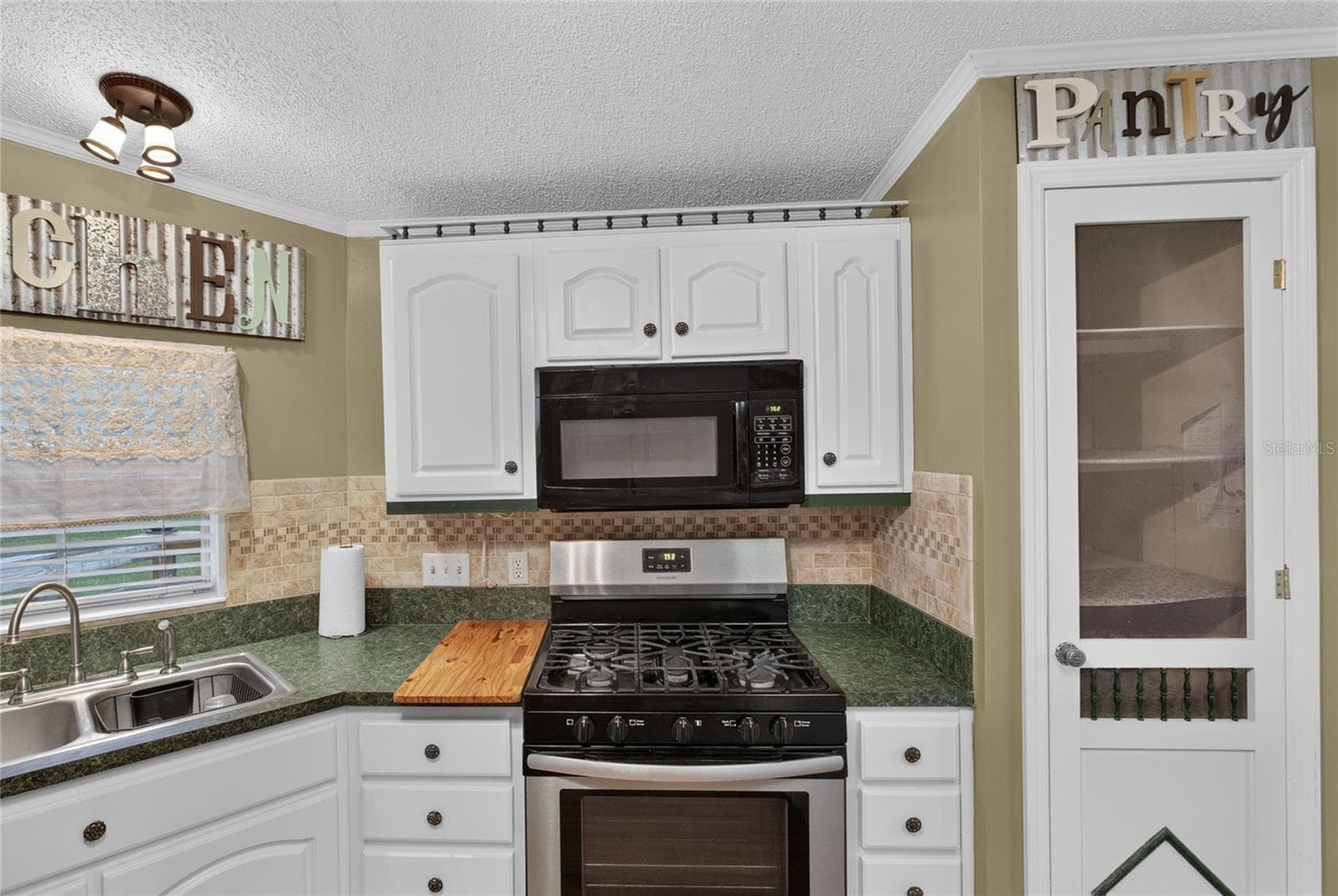 Manufactured Home at 7990 FLORAL RIDGE CIR, KEYSTONE HEIGHTS, photo 27 of 52