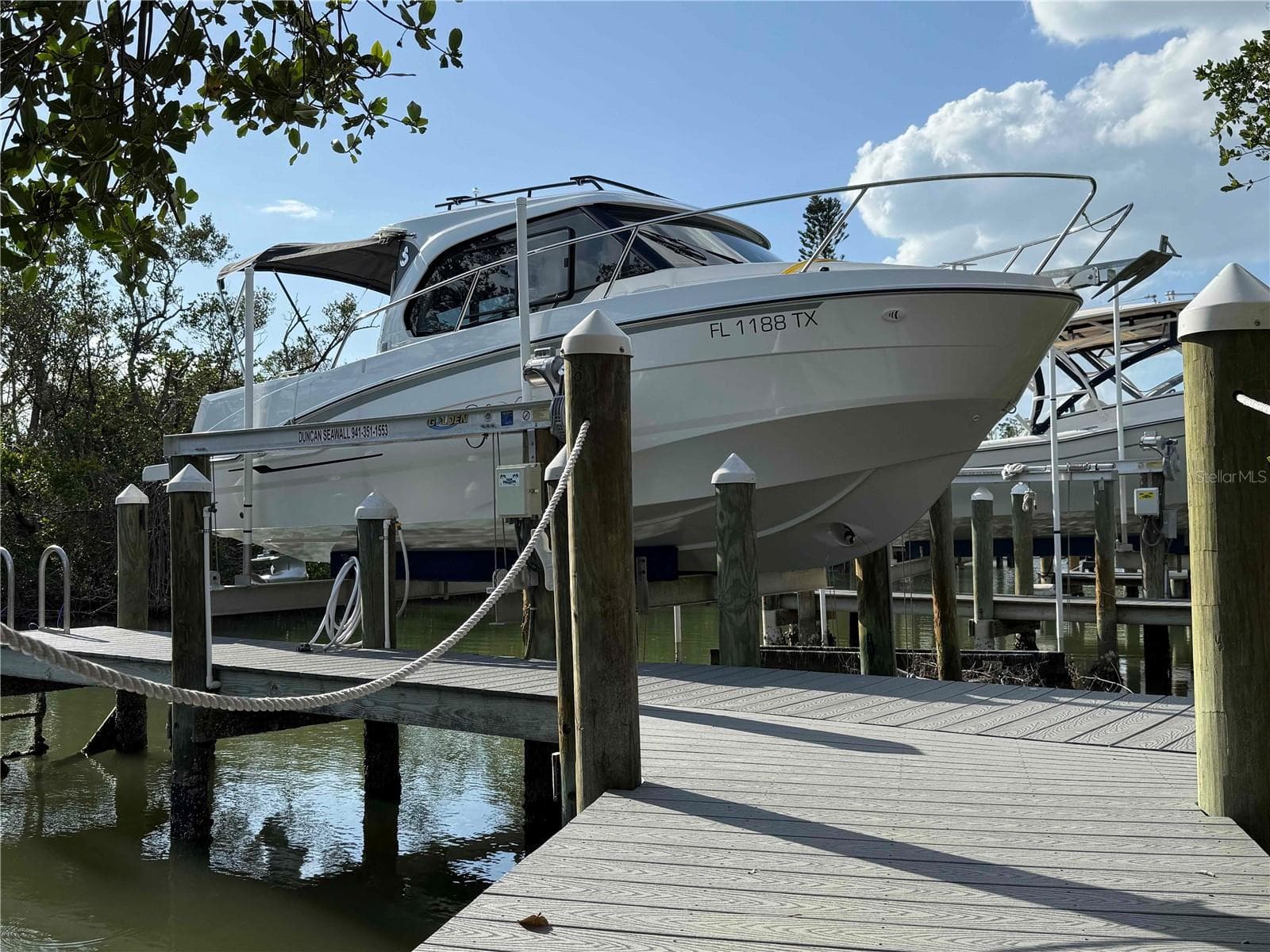 10,000 lb. capacity boat lift and dock included - 615 DREAM ISLAND PL #212, LONGBOAT KEY