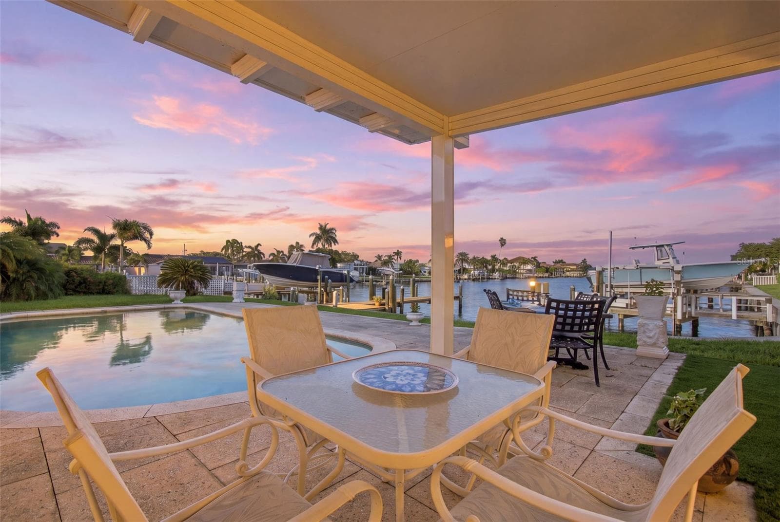 Enjoy beautiful sunsets in your backyard oasis - 11975 7TH ST E, TREASURE ISLAND