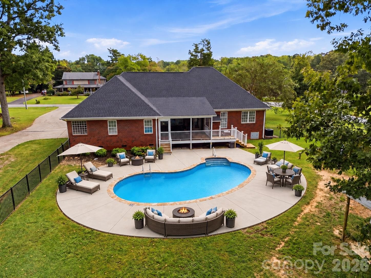 Outdoor pool furniture has been virtually staged for illustrative purposes. - 5100 Basswood Drive, Concord