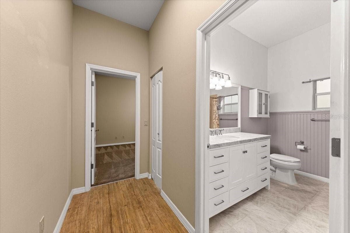 Hallway to Third Bedroom - 5592 NE 61ST AVENUE RD, SILVER SPRINGS