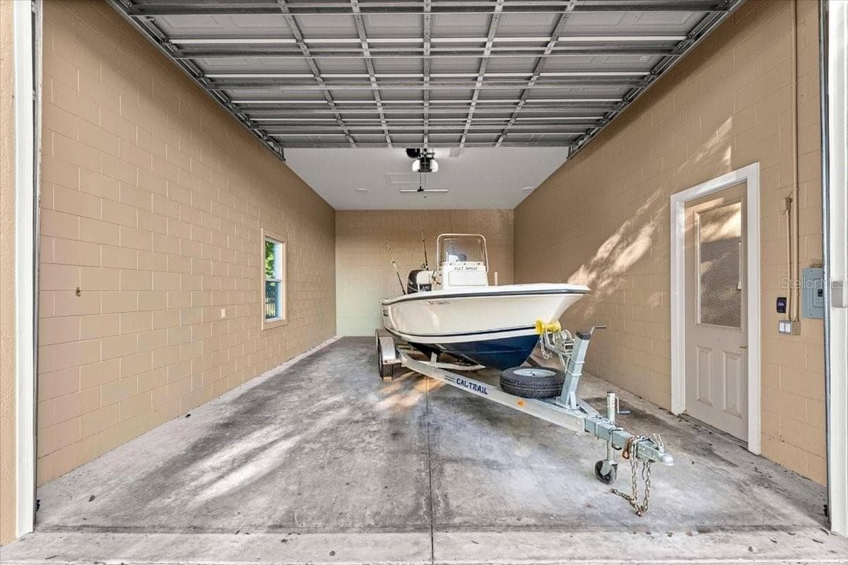 20'x32' Oversized Garage with 12 foot automatic door - 5592 NE 61ST AVENUE RD, SILVER SPRINGS
