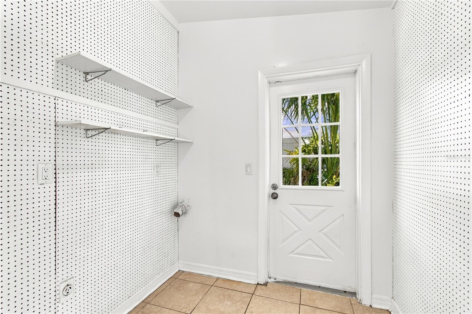 Laundry room off the primary bedroom - 10312 LAKE CARROLL WAY, TAMPA