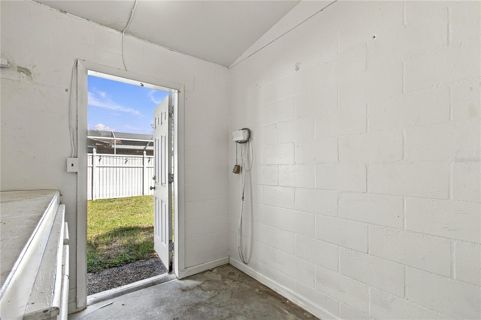 Storage room attached to home located in rear - 10312 LAKE CARROLL WAY, TAMPA