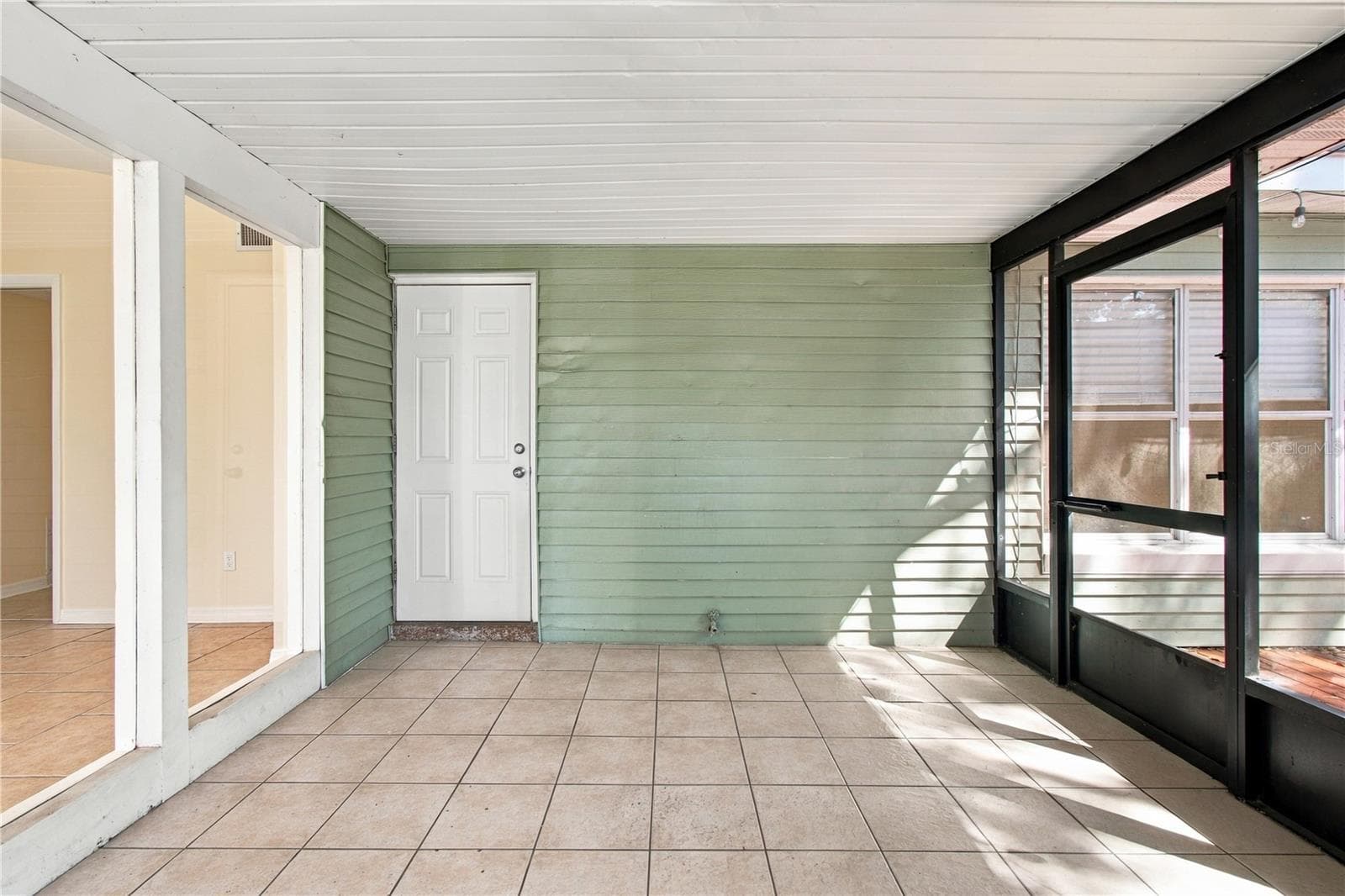 Patio facing door to hallway - 10312 LAKE CARROLL WAY, TAMPA