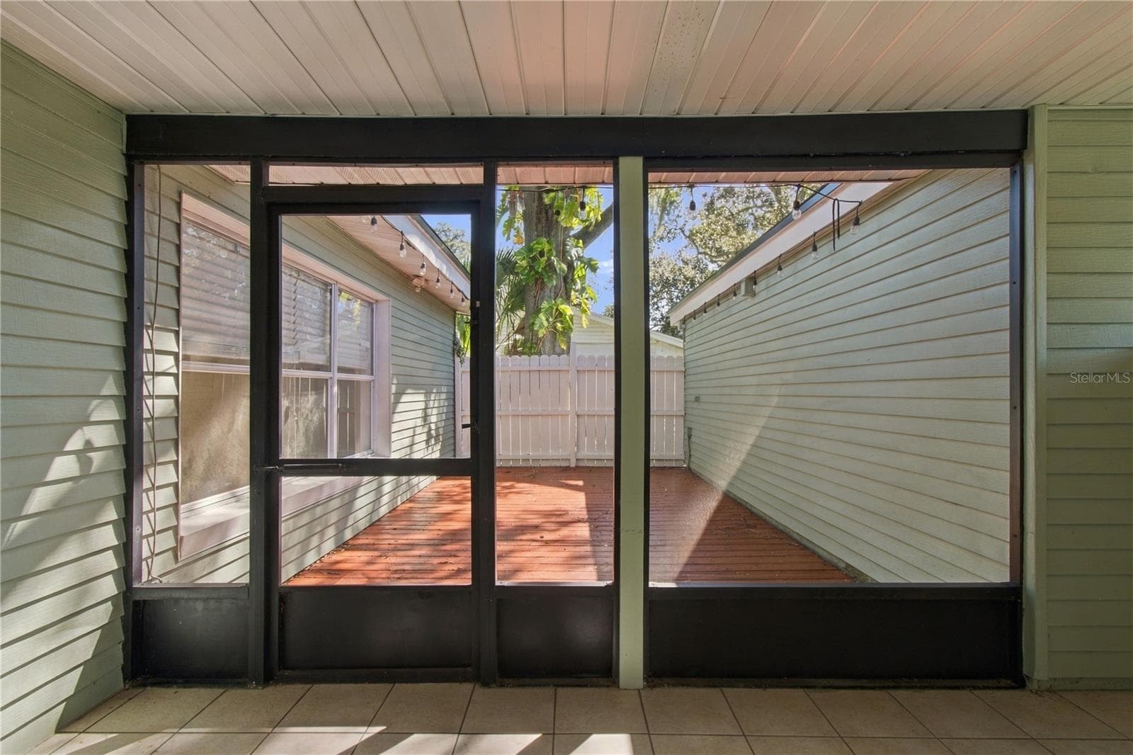 enclosed Patio overlooking exterior Deck - 10312 LAKE CARROLL WAY, TAMPA